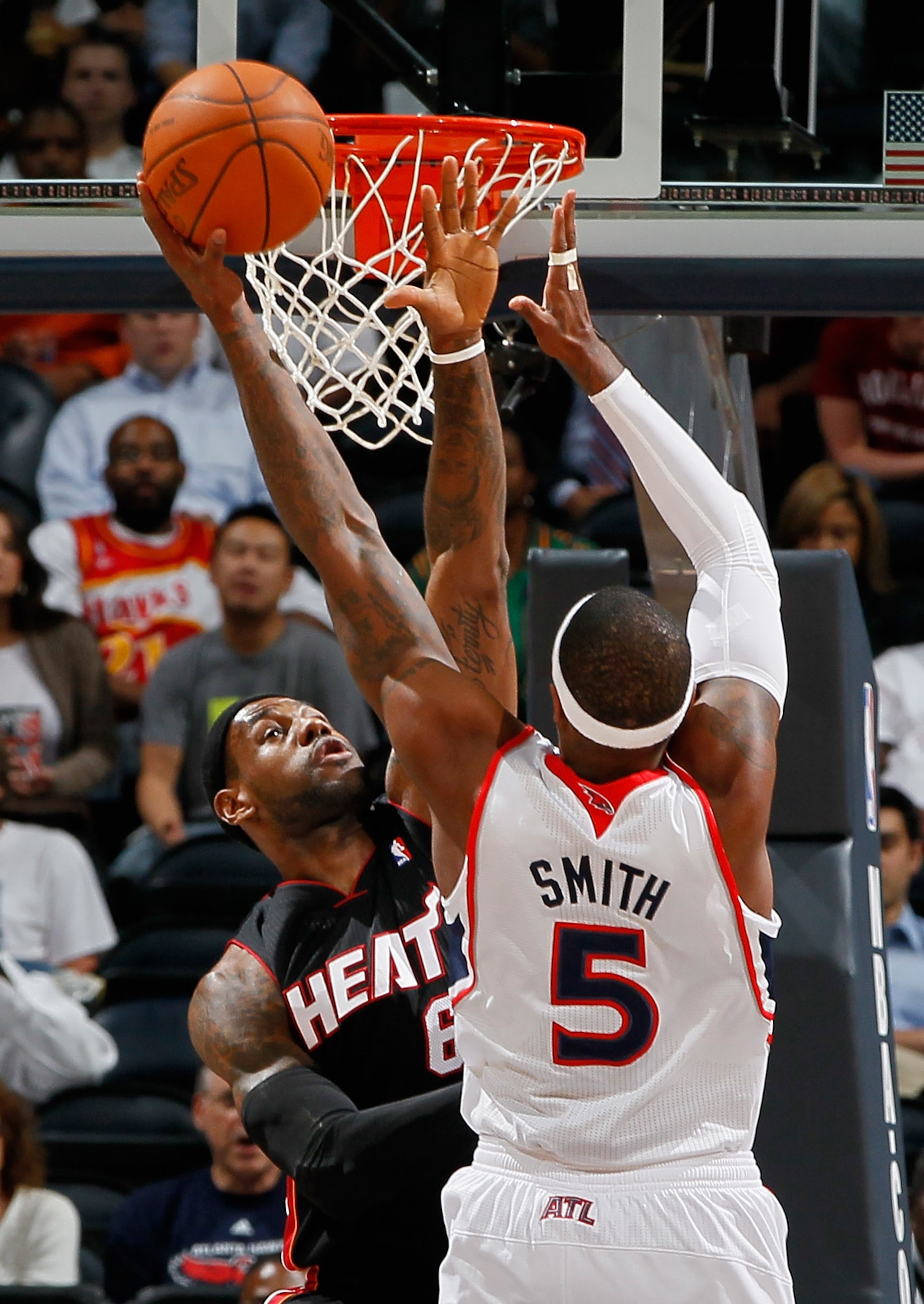 ATLANTA - OCTOBER 21:  LeBron James #6 of the Miami Heat defends the basket against Josh Smith #5 of the Atlanta Hawks at Philips Arena on October 21, 2010 in Atlanta, Georgia.  (Photo by Kevin C. Cox/Getty Images)