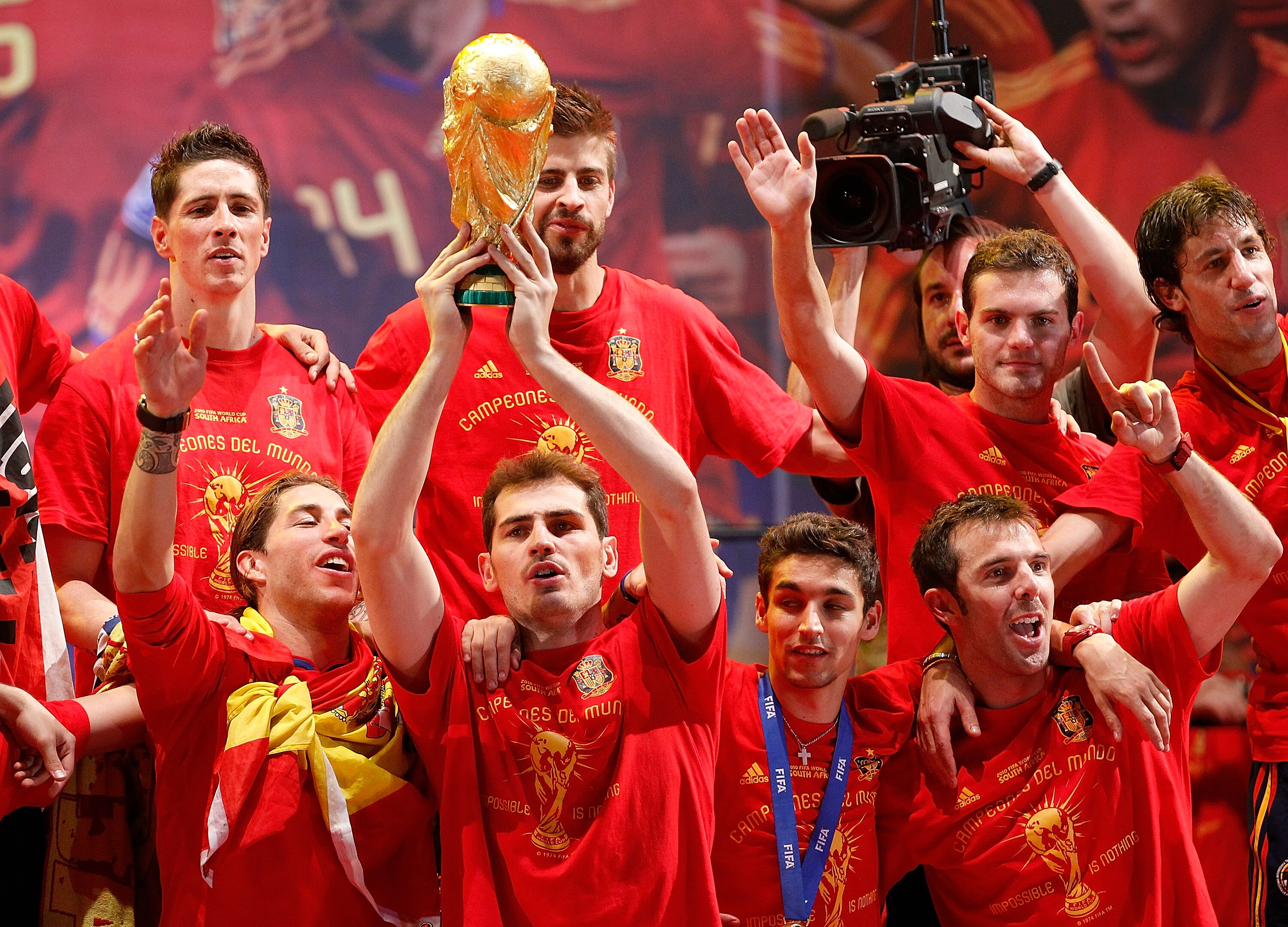 MADRID, SPAIN - JULY 12:  Iker Casillas of Spanish national football team holds the trophy during the Spanish team's victory parade following their victory over the Netherlands in the 2010 FIFA World Cup on July 12, 2010 in Madrid, Spain.  (Photo by Angel