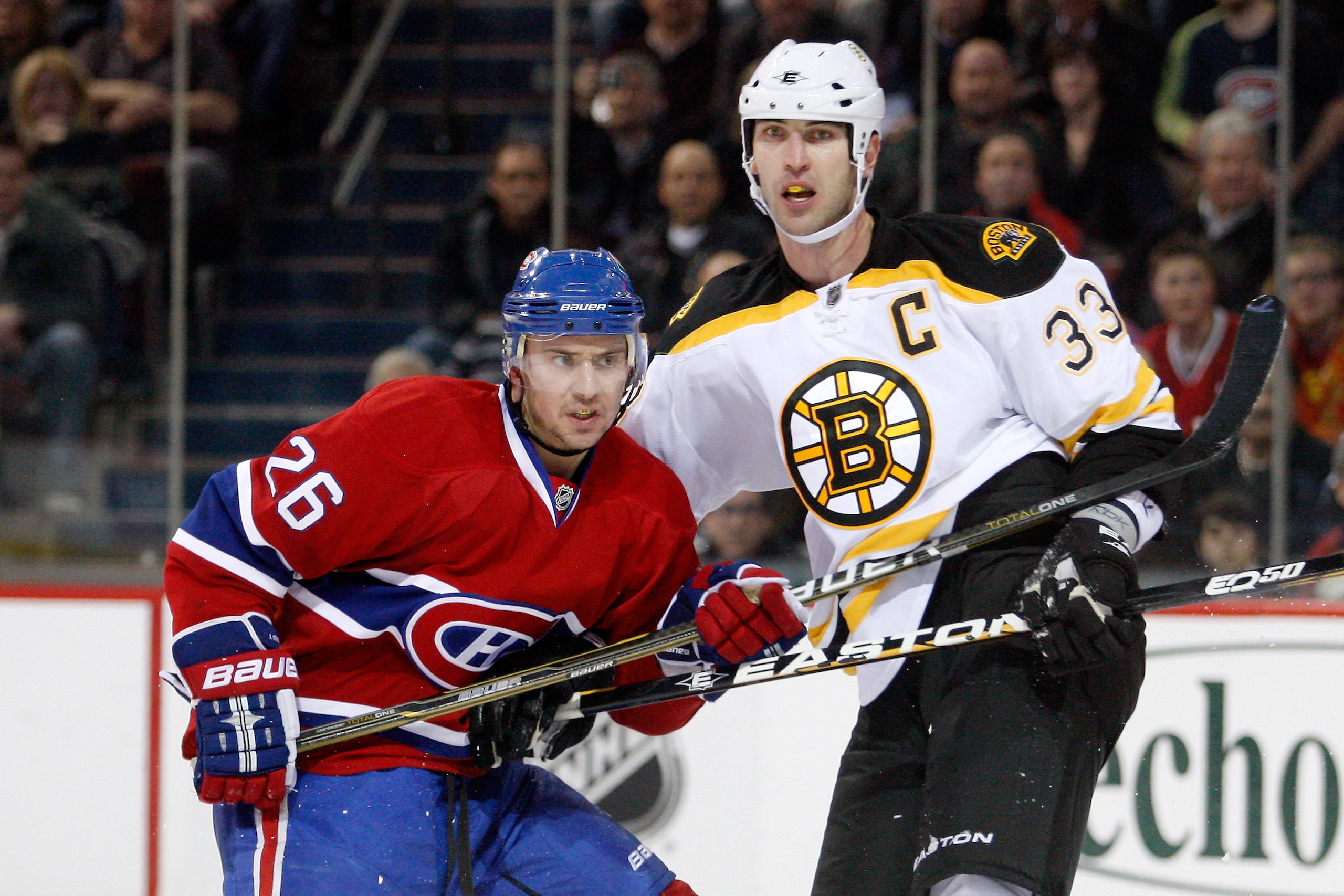 MONTREAL, CANADA - DECEMBER 16: Josh Gorges #26 of the Montreal Canadiens defends against Zdeno Chara #33 of the Boston Bruins during the NHL game at the Bell Centre on December 16, 2010 in Montreal, Quebec, Canada. The Canadiens defeated the Bruins 4-3 MONTREAL, CANADA - DECEMBER 16: Josh Gorges #26 of the Montreal Canadiens defends against Zdeno Chara #33 of the Boston Bruins during the NHL game at the Bell Centre on December 16, 2010 in Montreal, Quebec, Canada. The Canadiens defeated the Bruins 4-3