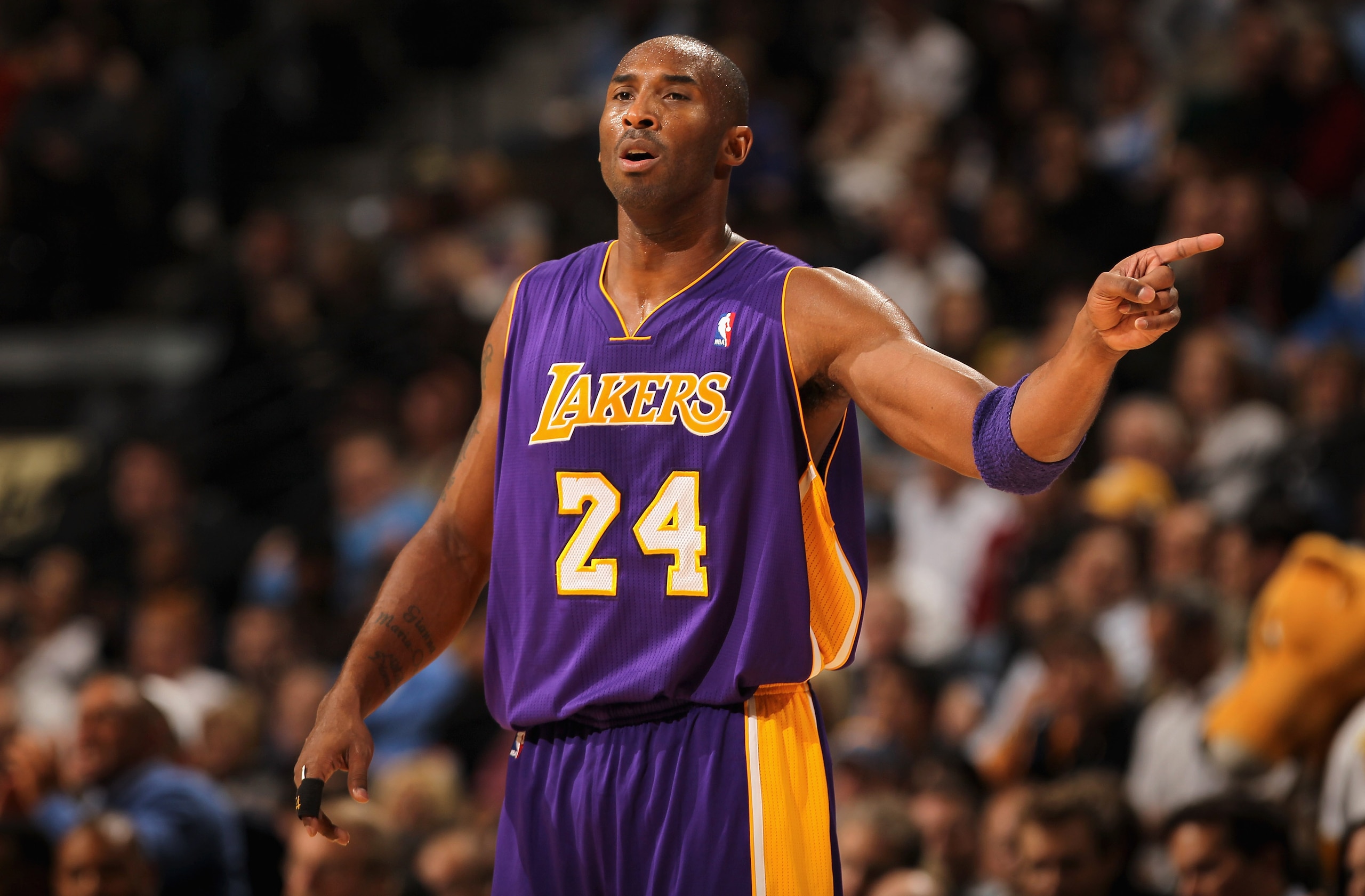 DENVER - NOVEMBER 11:  Kobe Bryant #24 of the Los Angeles Lakers looks on during a break in the action against the Denver Nuggets at the Pepsi Center on November 11, 2010 in Denver, Colorado. The Nuggets defeated the Lakers 118-112.  NOTE TO USER: User ex