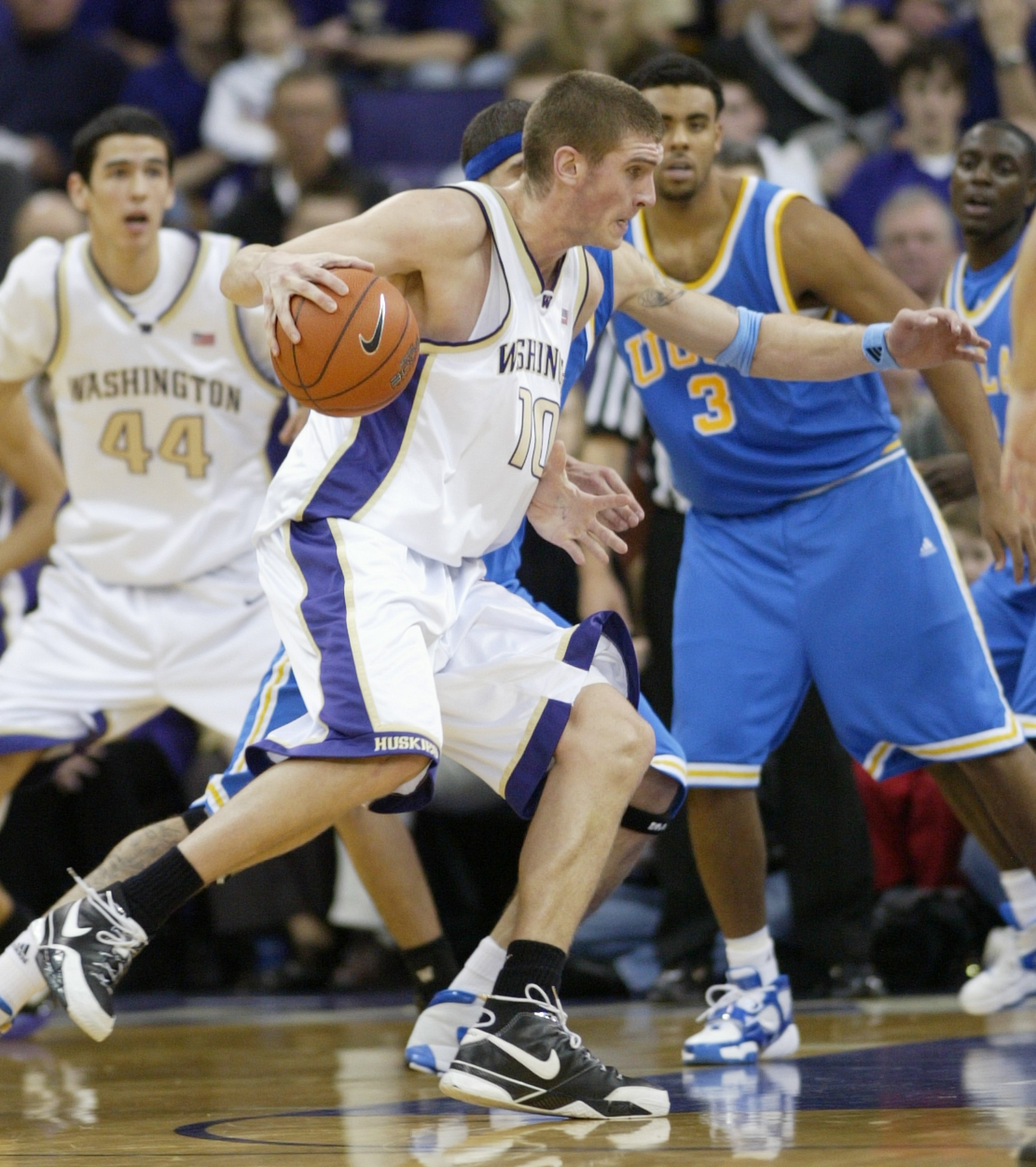 SEATTLE - MARCH 3:  Spencer Hawes #10 of the Washington Huskies drives against the UCLA Bruins at Edmundson Pavilion March 3, 2007 in Seattle, Washington. The Huskies defeated the Bruins 61-51.  (Photo by Otto Greule Jr/Getty Images)