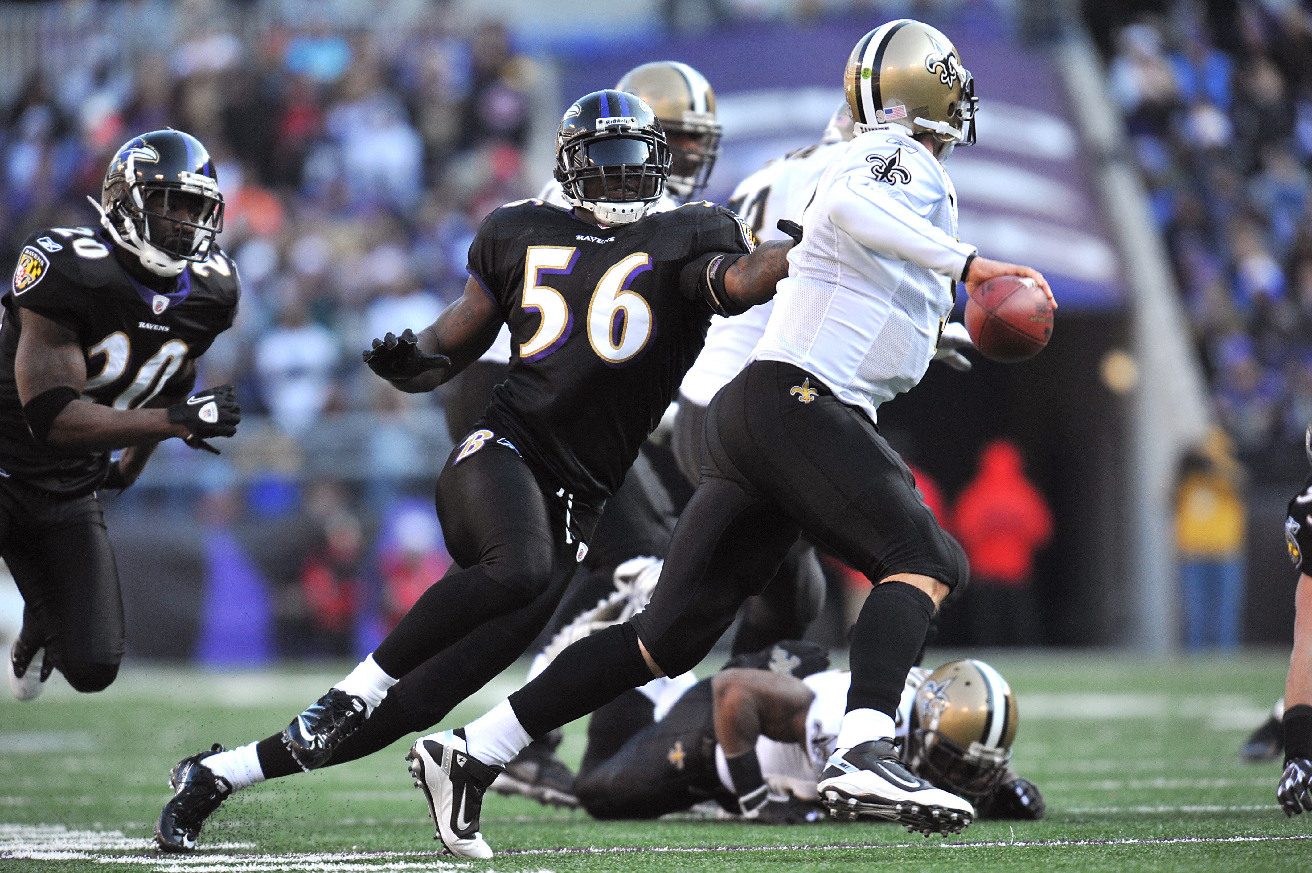 BALTIMORE, MD - DECEMBER 19:  Tavares Gooden #56 of the Baltimore Ravens chases Drew Brees #9 of the New Orleans Saints  at M&T Bank Stadium on December 19, 2010 in Baltimore, Maryland. The Ravens defeated the Saints 30-24. (Photo by Larry French/Getty Im