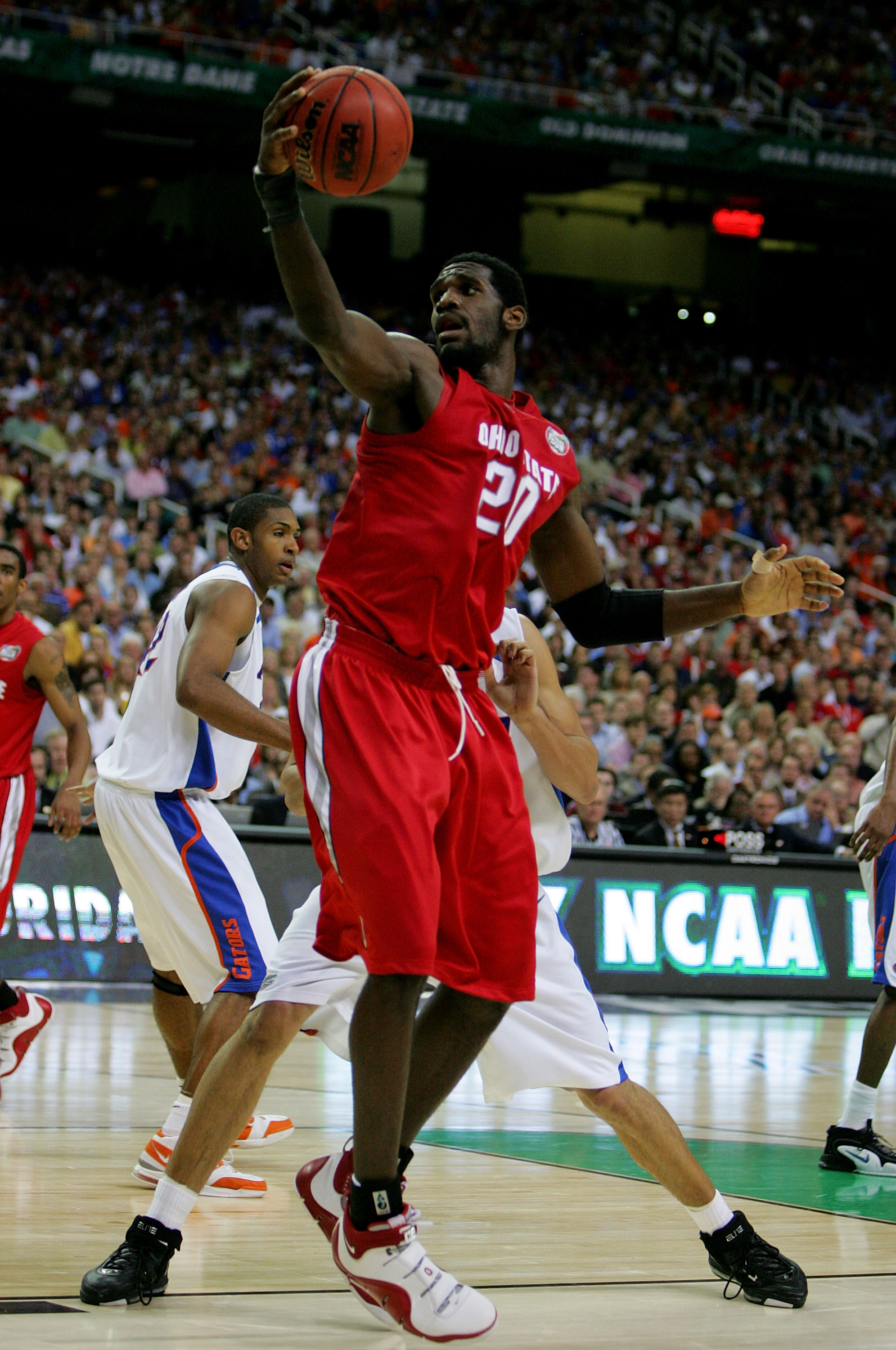 ATLANTA - APRIL 02:  Greg Oden #20 of the Ohio State Buckeyes handles the ball against the Florida Gators in the NCAA Men's Basketball Championship game at the Georgia Dome on April 2, 2007 in Atlanta, Georgia.  (Photo by Andy Lyons/Getty Images)