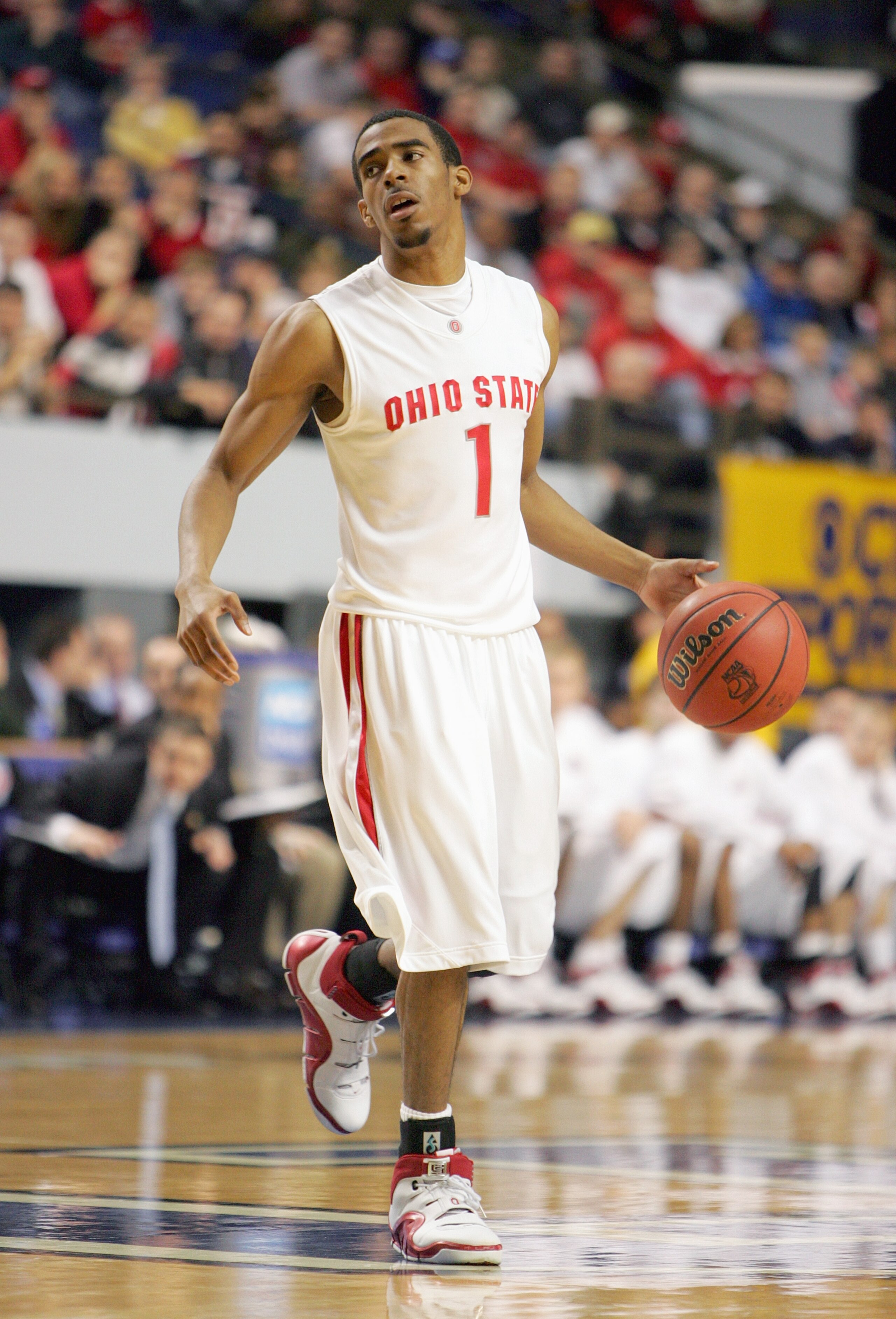 LEXINGTON, KY - MARCH 17:  Mike Conley Jr #1 of the Ohio State Buckeyes dribbles the ball upcourt against the Xavier Musketeers during round two of the NCAA Men's Basketball Tournament at Rupp Arena on March 17, 2007 in Lexington, Kentucky. (Photo by Andy