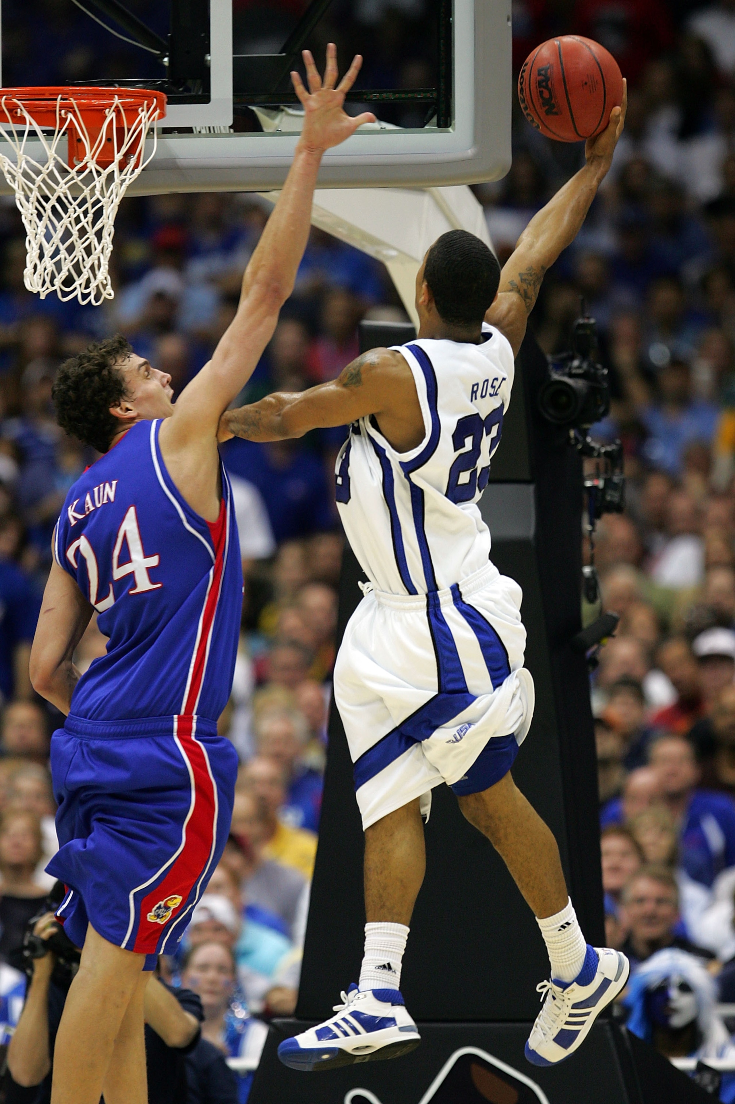 SAN ANTONIO - APRIL 07:  Derrick Rose #23 of the Memphis Tigers shoots over Sasha Kaun #24 of the Kansas Jayhawks in the second half during the 2008 NCAA Men's National Championship game at the Alamodome on April 7, 2008 in San Antonio, Texas.  (Photo by 
