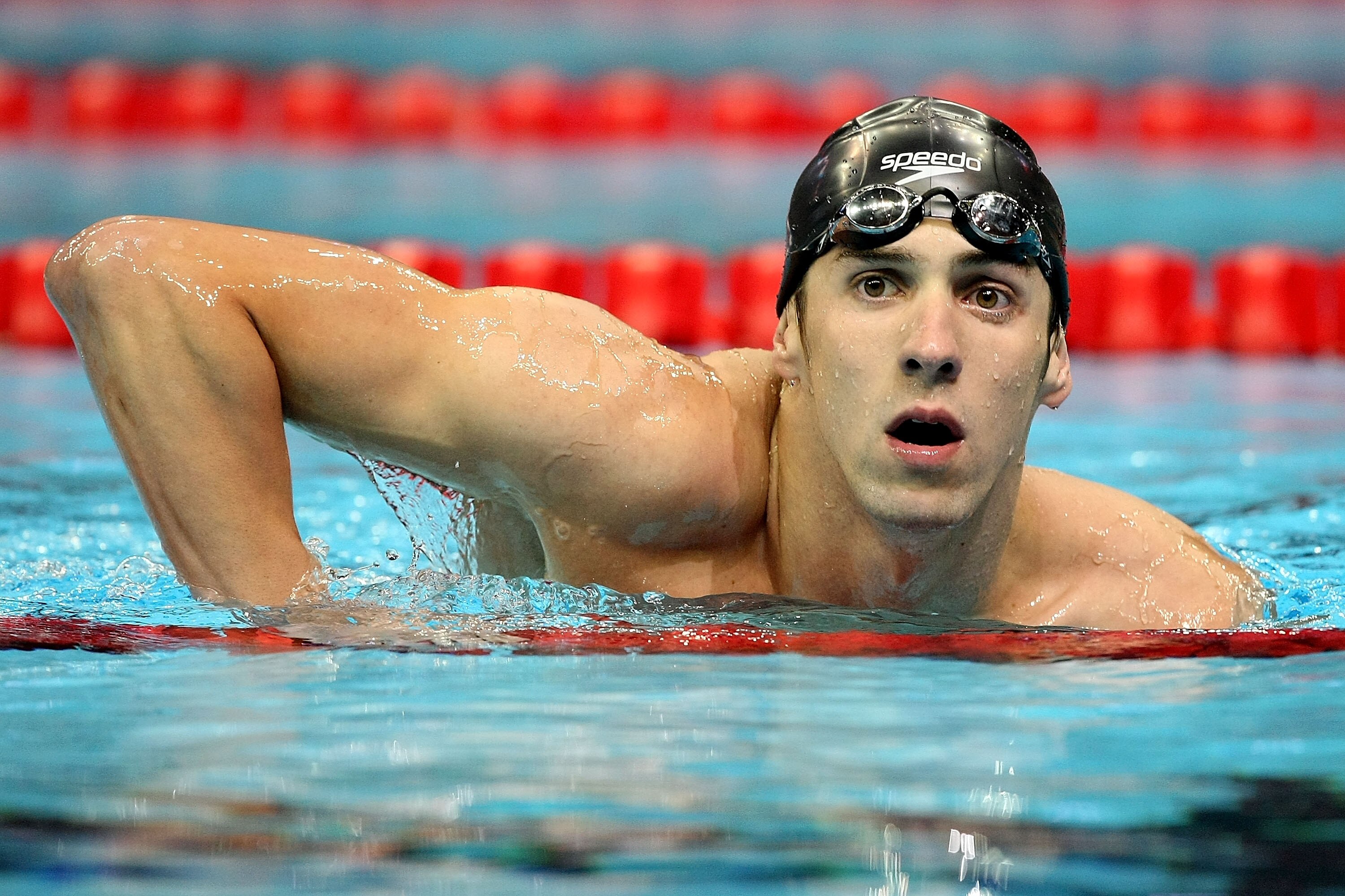 OMAHA, NE - JULY 01:  Michael Phelps gets out of the pool after winning his semifinal heat of the 200 meter butterfly during the U.S. Swimming Olympic Trials on July 1, 2008 at the Qwest Center in Omaha, Nebraska.  (Photo by Al Bello/Getty Images)