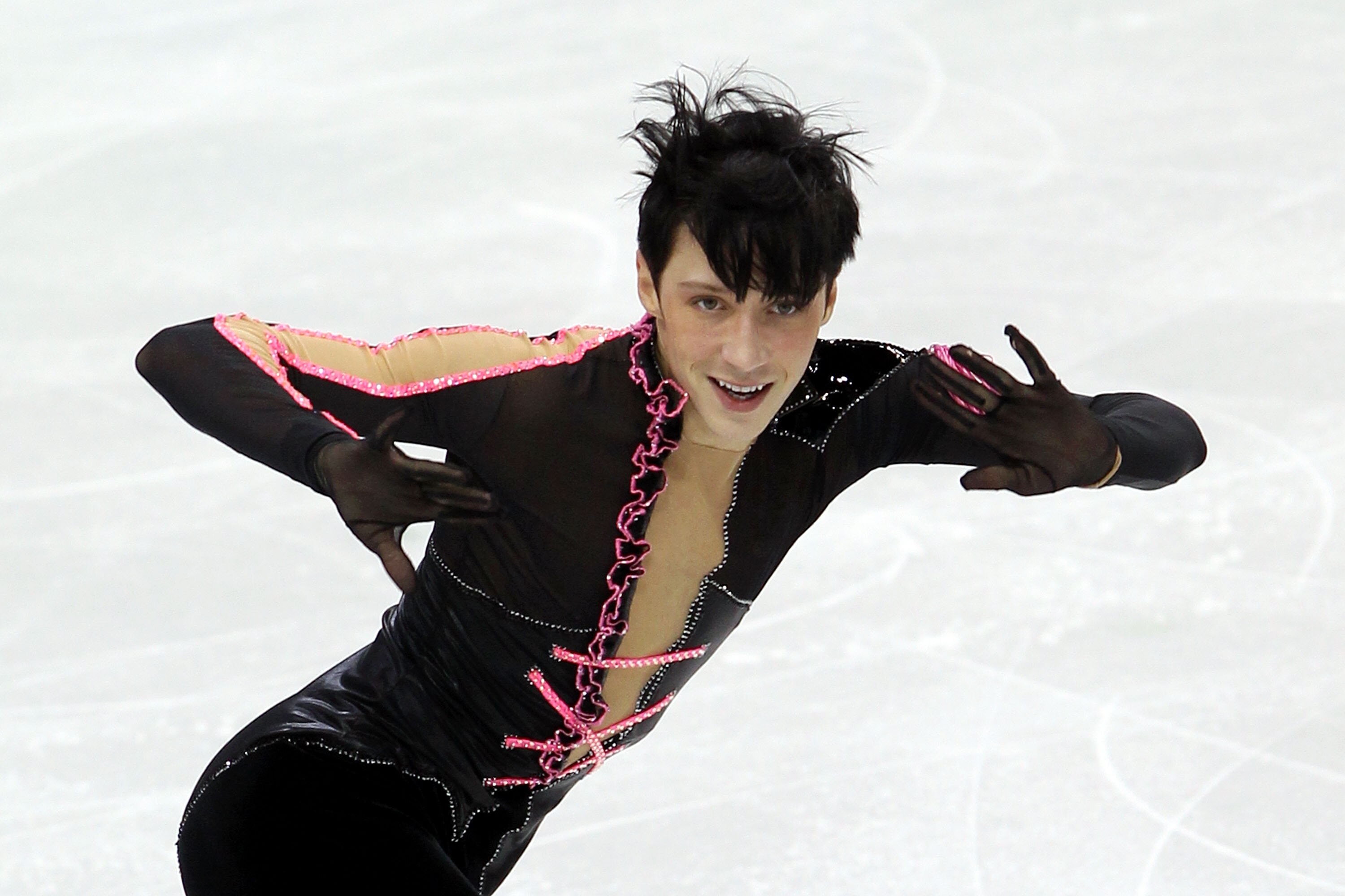 VANCOUVER, BC - FEBRUARY 16:  Johnny Weir of the United States competes in the men's figure skating short program on day 5 of the Vancouver 2010 Winter Olympics at the Pacific Coliseum on February 16, 2010 in Vancouver, Canada.  (Photo by Matthew Stockman