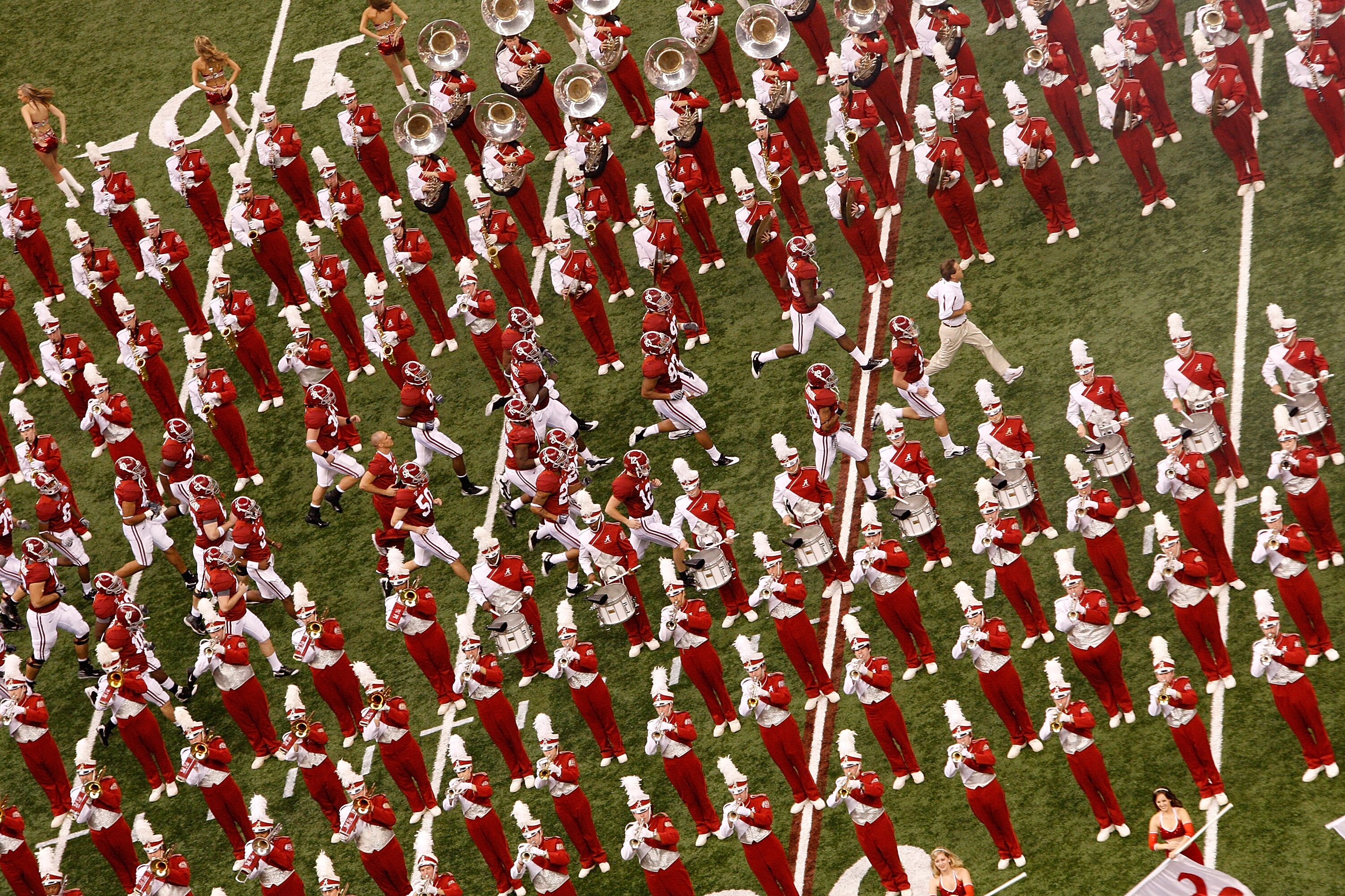 NEW ORLEANS - JANUARY 02:  The Alabama Crimson Tide is led out onto the field by head coach Nick Saban before taking on the Utah Utes during the 75th Allstate Sugar Bowl at the Louisiana Superdome on January 2, 2009 in New Orleans, Louisiana.  (Photo by C