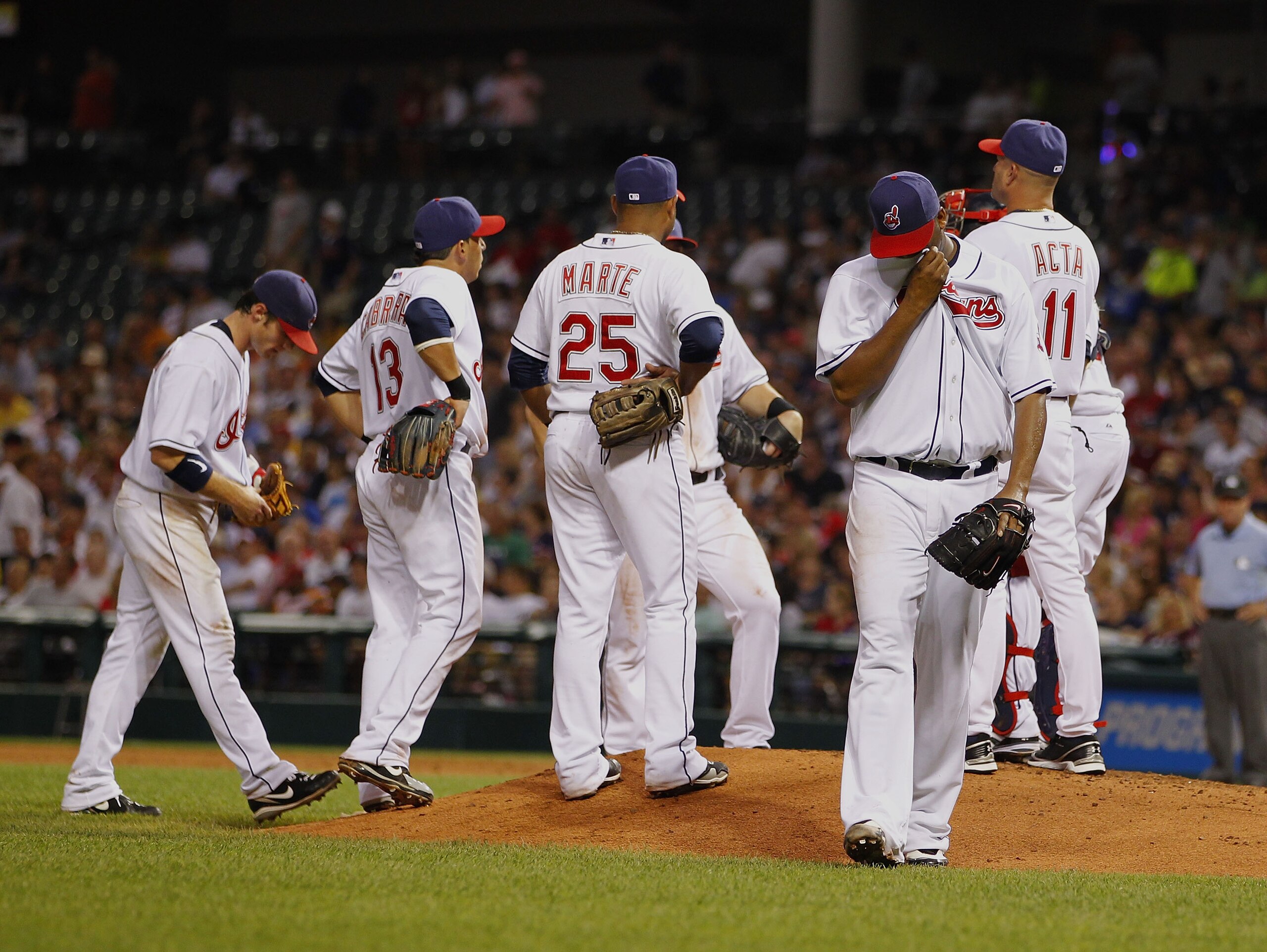 CLEVELAND - JULY 28:  Fausto Carmona #55 of the Cleveland Indians leaves the mound in the third inning while playing the New York Yankees on July 28, 2010 at Progressive Field in Cleveland, Ohio.  (Photo by Gregory Shamus/Getty Images)