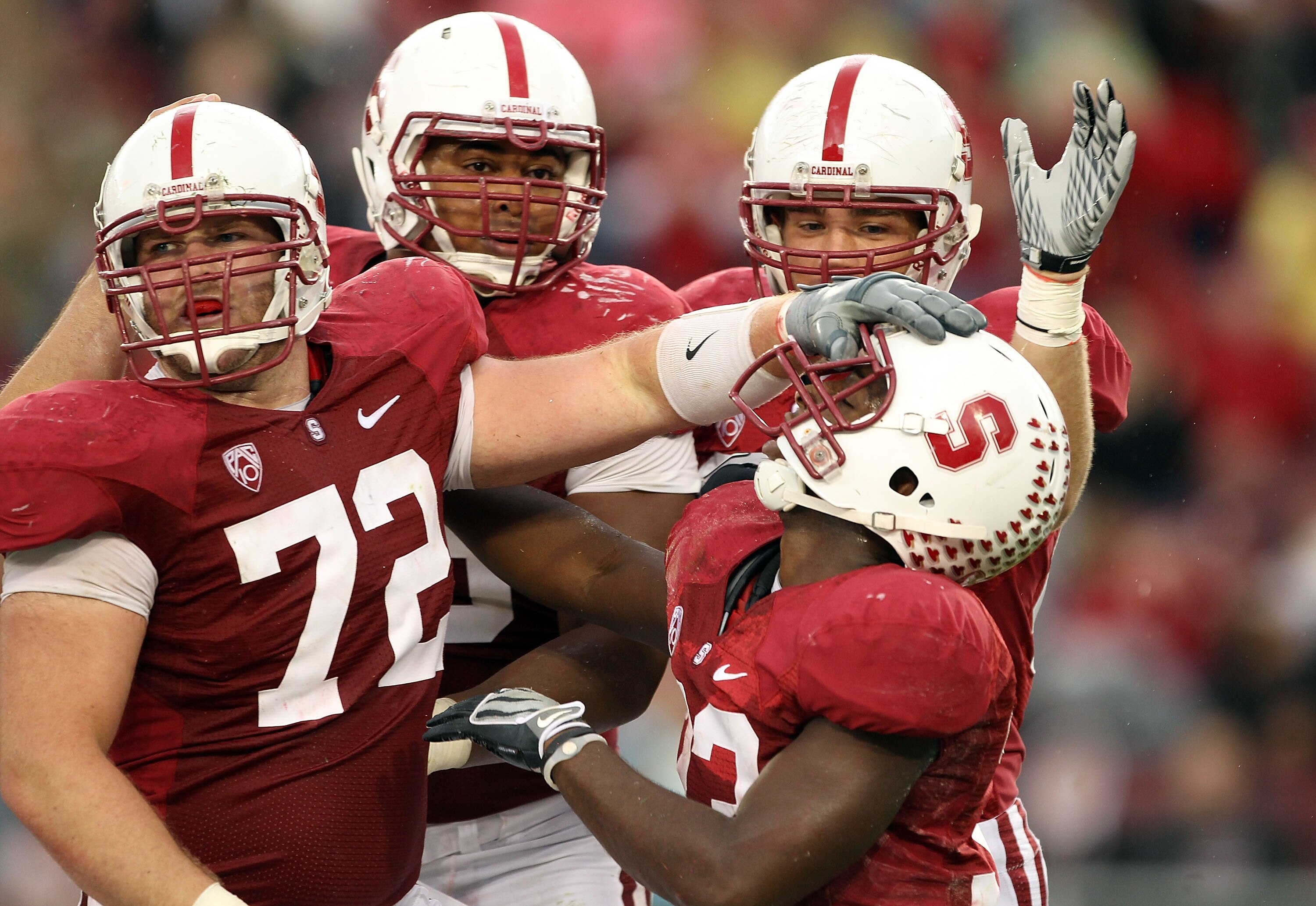 PALO ALTO, CA - OCTOBER 23:  Stepfan Taylor #33 of the Stanford Cardinal is congratulated by Chase Beeler #72 after Taylor scored a touchdown against the Washington State Cougars at Stanford Stadium on October 23, 2010 in Palo Alto, California.  (Photo by