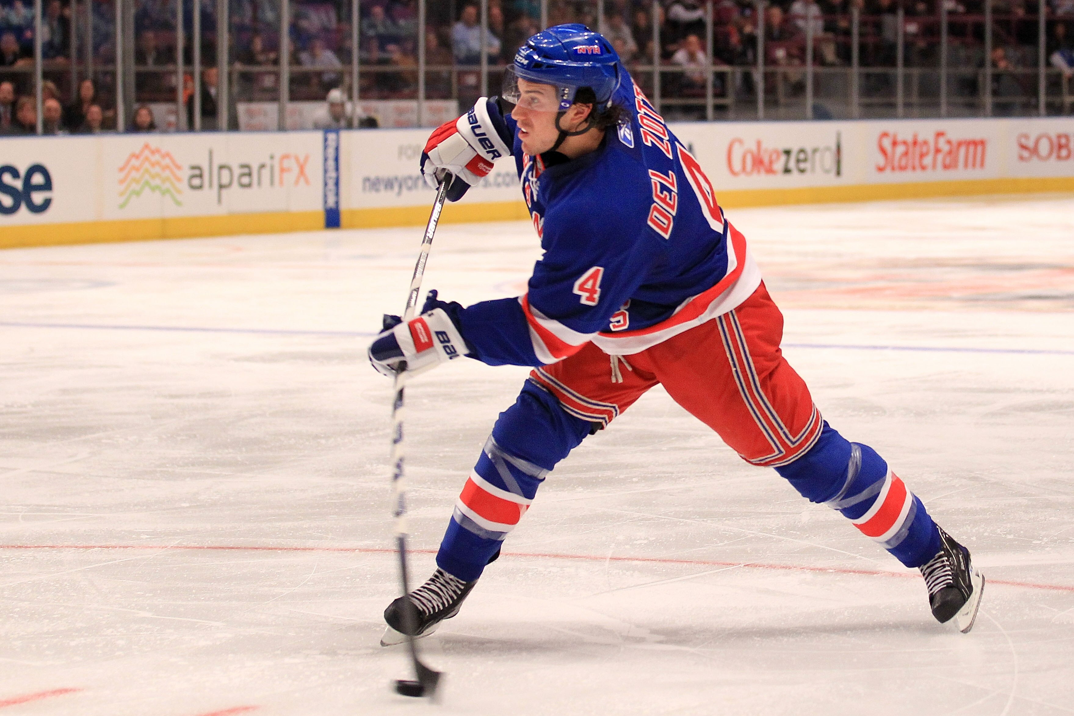 NEW YORK, NY - NOVEMBER 29:  Michael Del Zotto #4 of the New York Rangers attacks against the Pittsburgh Penguins during their game on November 29, 2010 at Madison Square Garden in New York City.  (Photo by Chris McGrath/Getty Images)