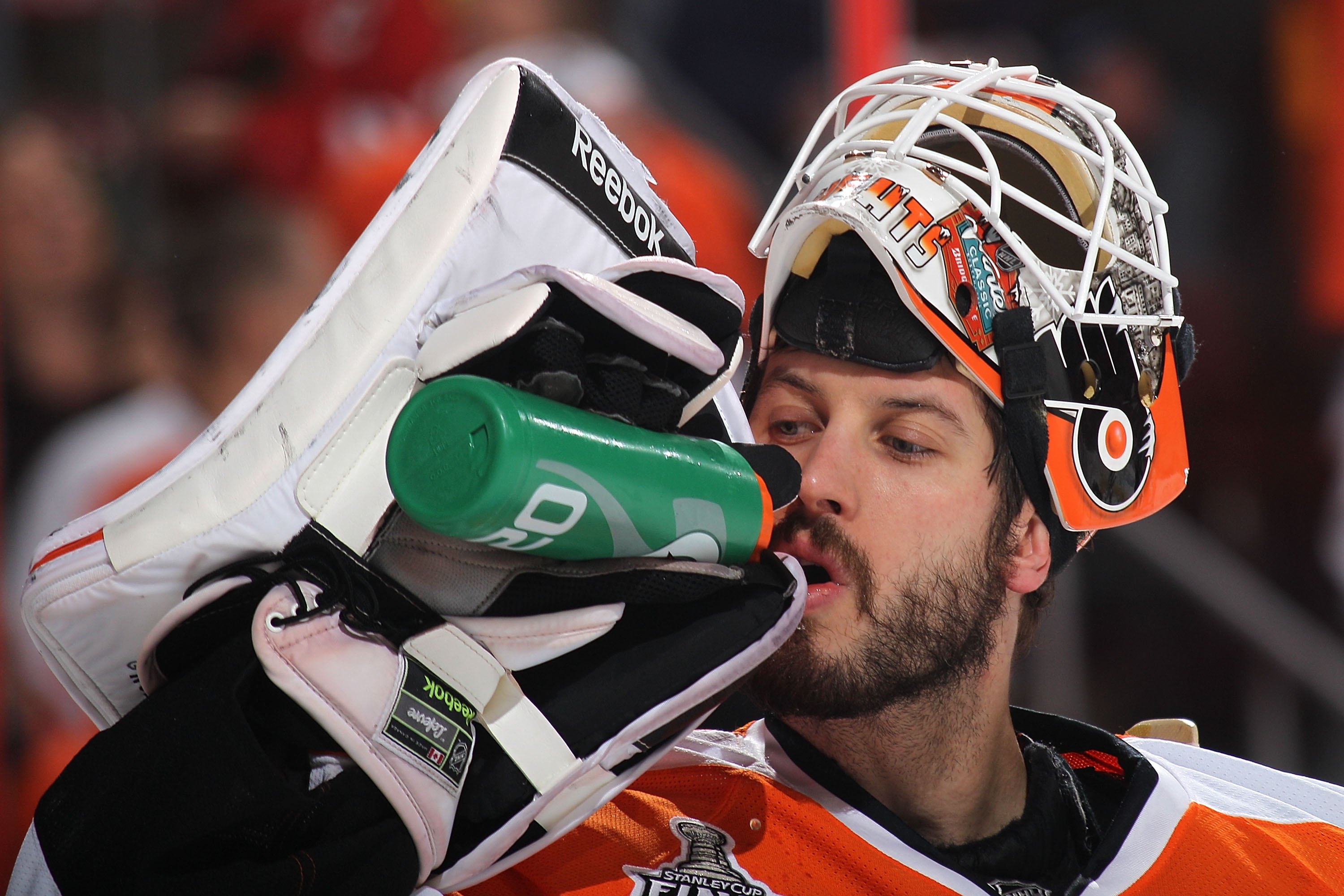 PHILADELPHIA - JUNE 09:  Michael Leighton #49 of the Philadelphia Flyers takes a drink before Game Six of the 2010 NHL Stanley Cup Final against the Chicago Blackhawks at the Wachovia Center on June 9, 2010 in Philadelphia, Pennsylvania.  (Photo by Bruce 