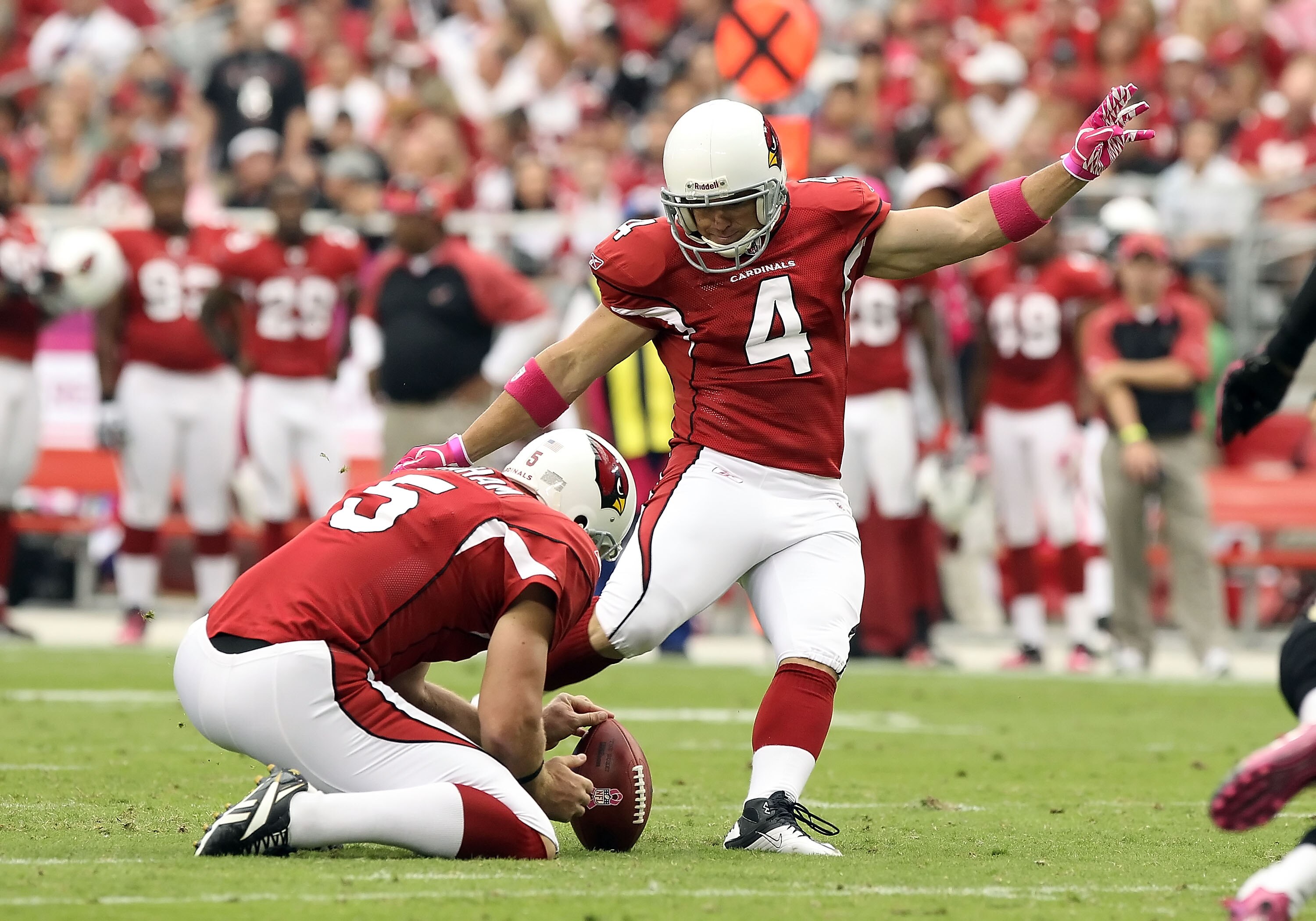 GLENDALE, AZ - OCTOBER 10:  Kicker Jay Feely #4 of the Arizona Cardinals attmpes a field goal during the NFL game against the New Orleans Saints at the University of Phoenix Stadium on October 10, 2010 in Glendale, Arizona. The Cardinals defeated the Sain