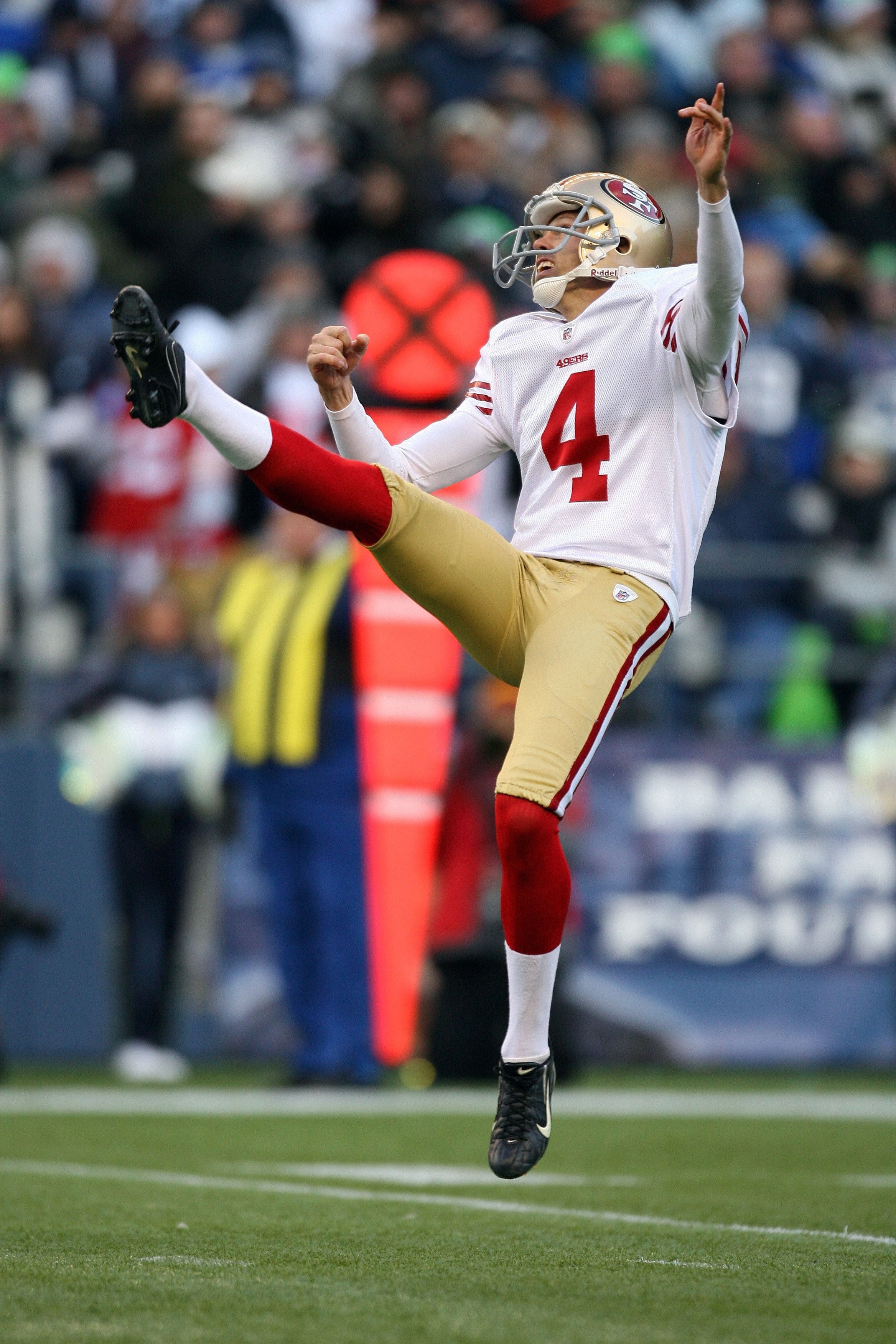 SEATTLE - DECEMBER 6:  Punter Andy Lee #4 of the San Francisco 49ers follows through on his kick during their NFL game against the Seattle Seahawks on December 6, 2009 at Qwest Field in Seattle, Washington. The Seahawks defeated the 49ers 20-17. (Photo by