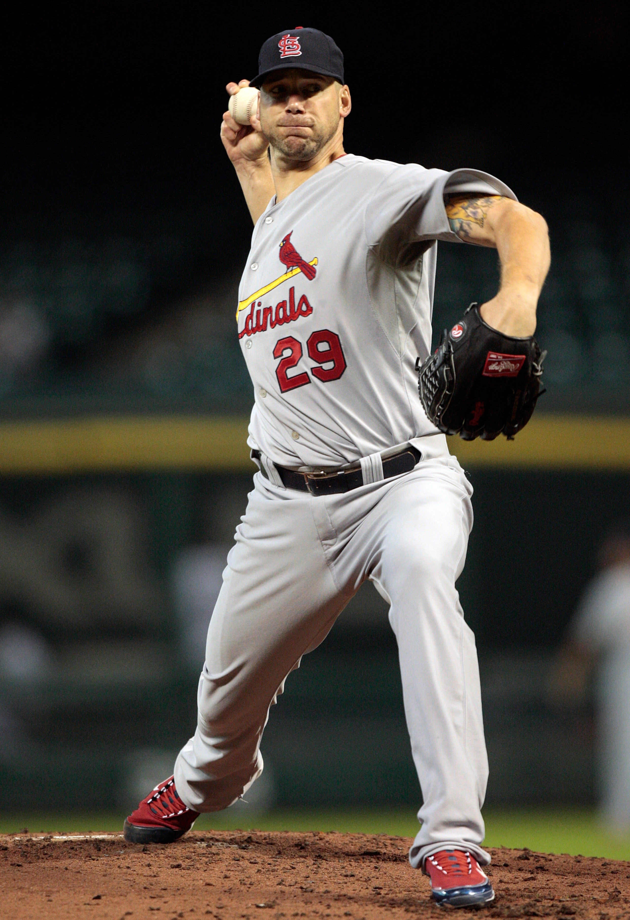HOUSTON - AUGUST 31:  Pitcher Chris Carpenter #29 of the St. Louis Cardinals throws against the Houston Astros at Minute Maid Park on August 31, 2010 in Houston, Texas. Houston won 3-0.  (Photo by Bob Levey/Getty Images)