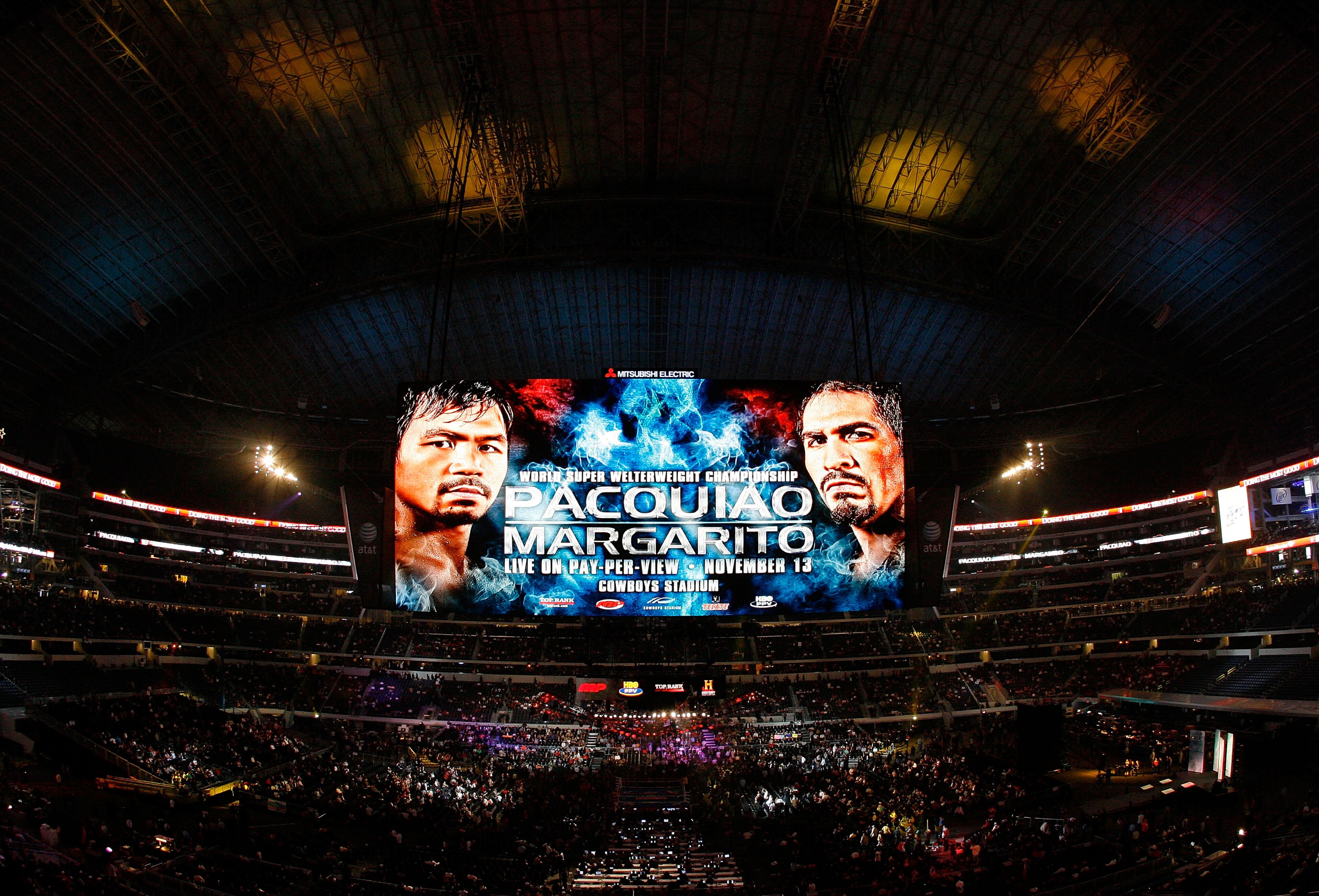 ARLINGTON, TX - NOVEMBER 13:  The giant video screen displays the main event title bout match up between Manny Pacquiao (L) of the Philippines and Antonio Margarito of Mexico prior to their WBC World Super Welterweight Title bout at Cowboys Stadium on Nov