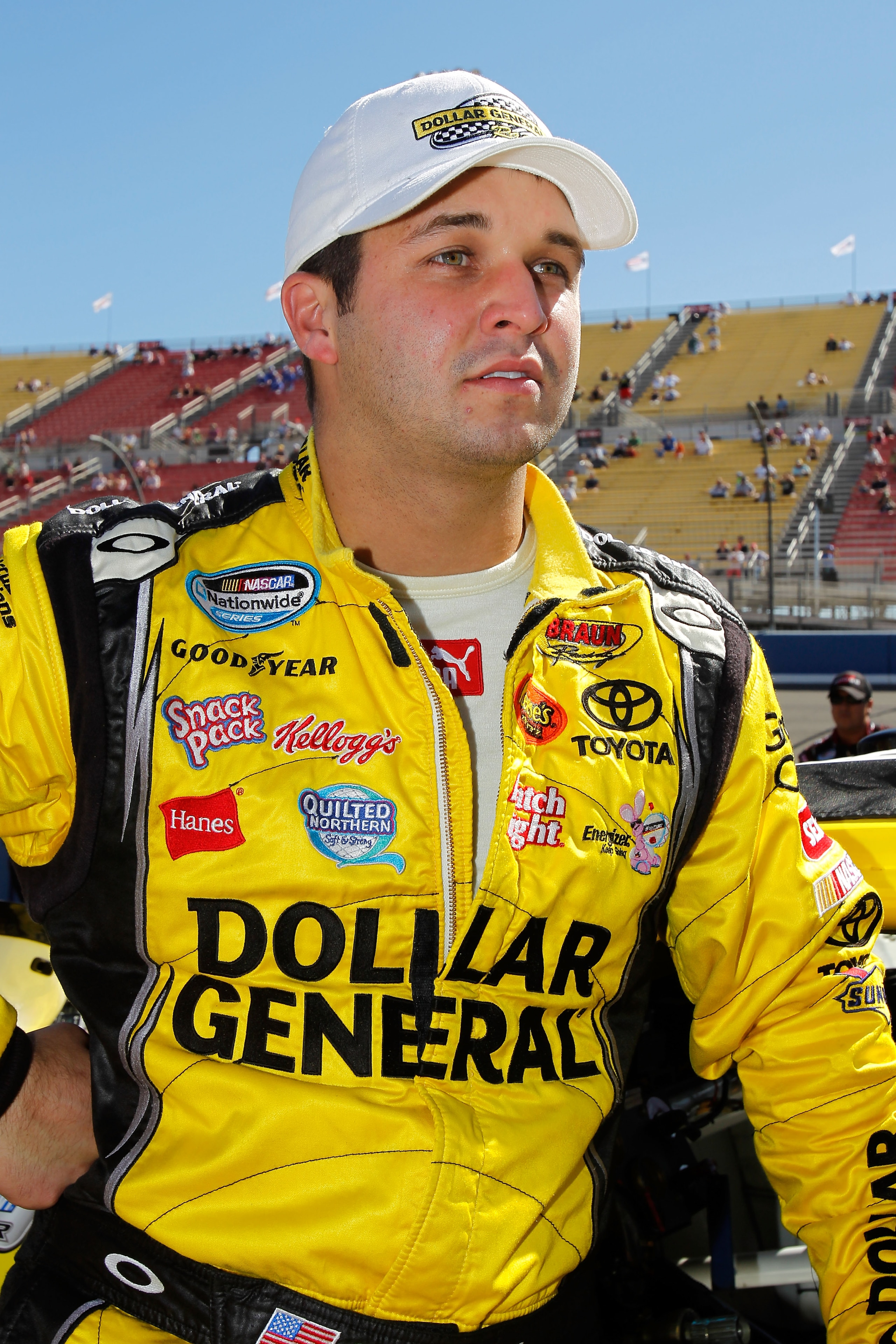 FONTANA, CA - OCTOBER 09:  Reed Sorenson, driver of the #32 Dollar General Toyota, stands on pit road prior to the NASCAR Nationwide Series CampingWorld.com 300 on October 9, 2010 in Fontana, California.  (Photo by Todd Warshaw/Getty Images for NASCAR)