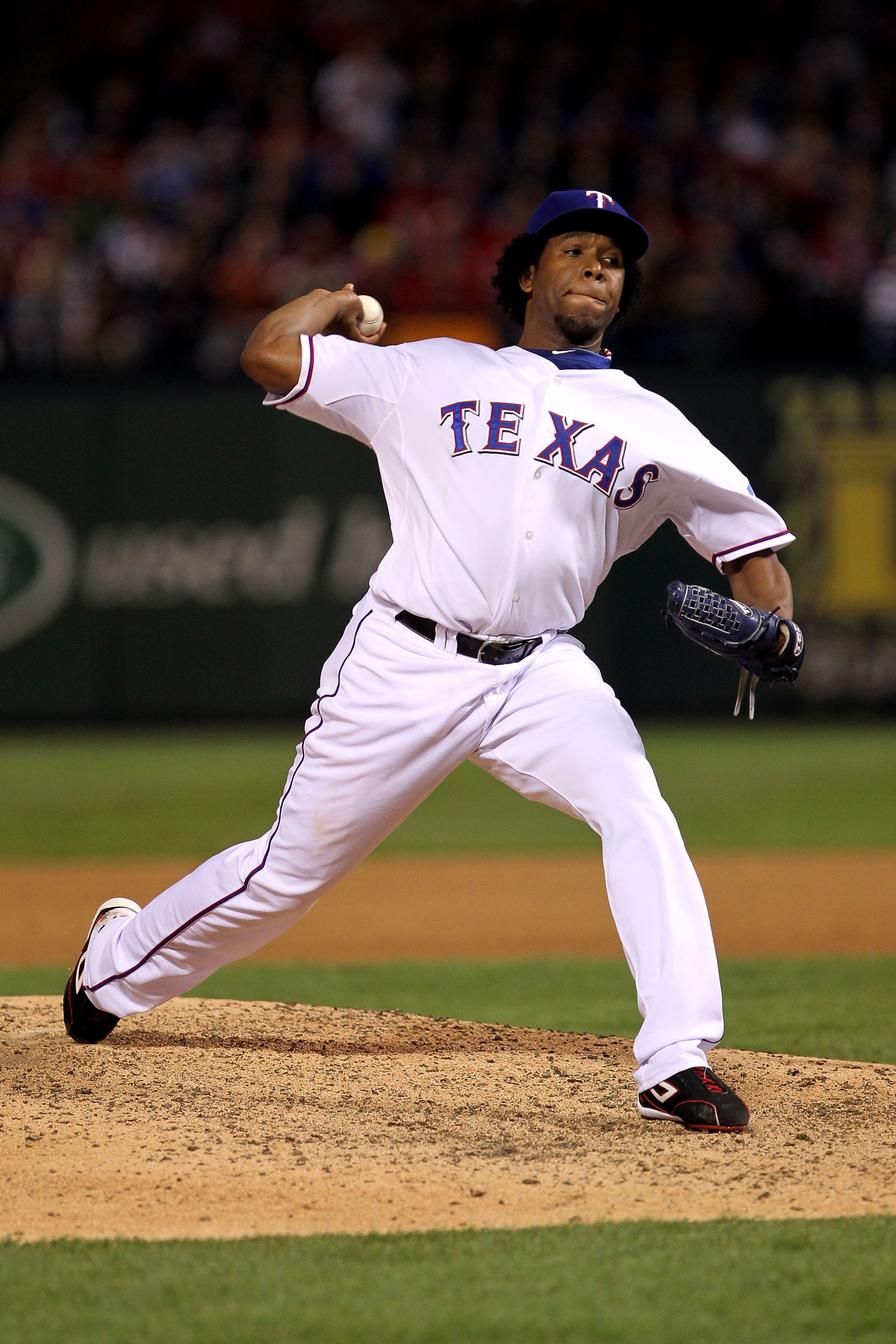 ARLINGTON, TX - NOVEMBER 01:  Neftali Feliz #30 of the Texas Rangers pitches against the San Francisco Giants in Game Five of the 2010 MLB World Series at Rangers Ballpark in Arlington on November 1, 2010 in Arlington, Texas. The Giants won 3-1.  (Photo b