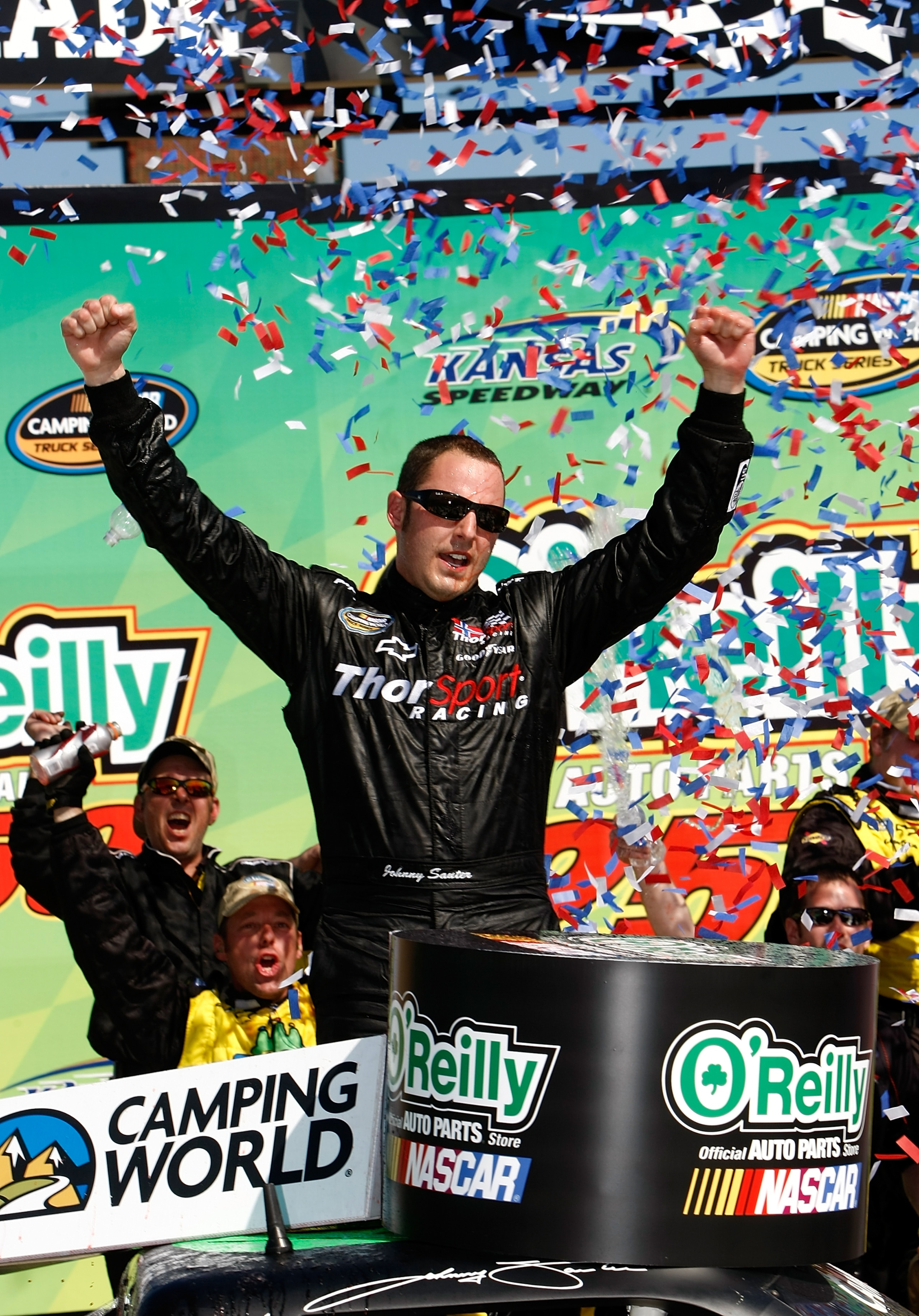 KANSAS CITY, KS - MAY 02:  Johnny Sauter driver of the #13 In Country Television Chevrolet celebrates winning the NASCAR Camping World Truck Series O'Reilly Auto Parts 250 on May 2, 2010 at Kansas Speedway in Kansas City, Kansas.  (Photo by Jonathan Ferre