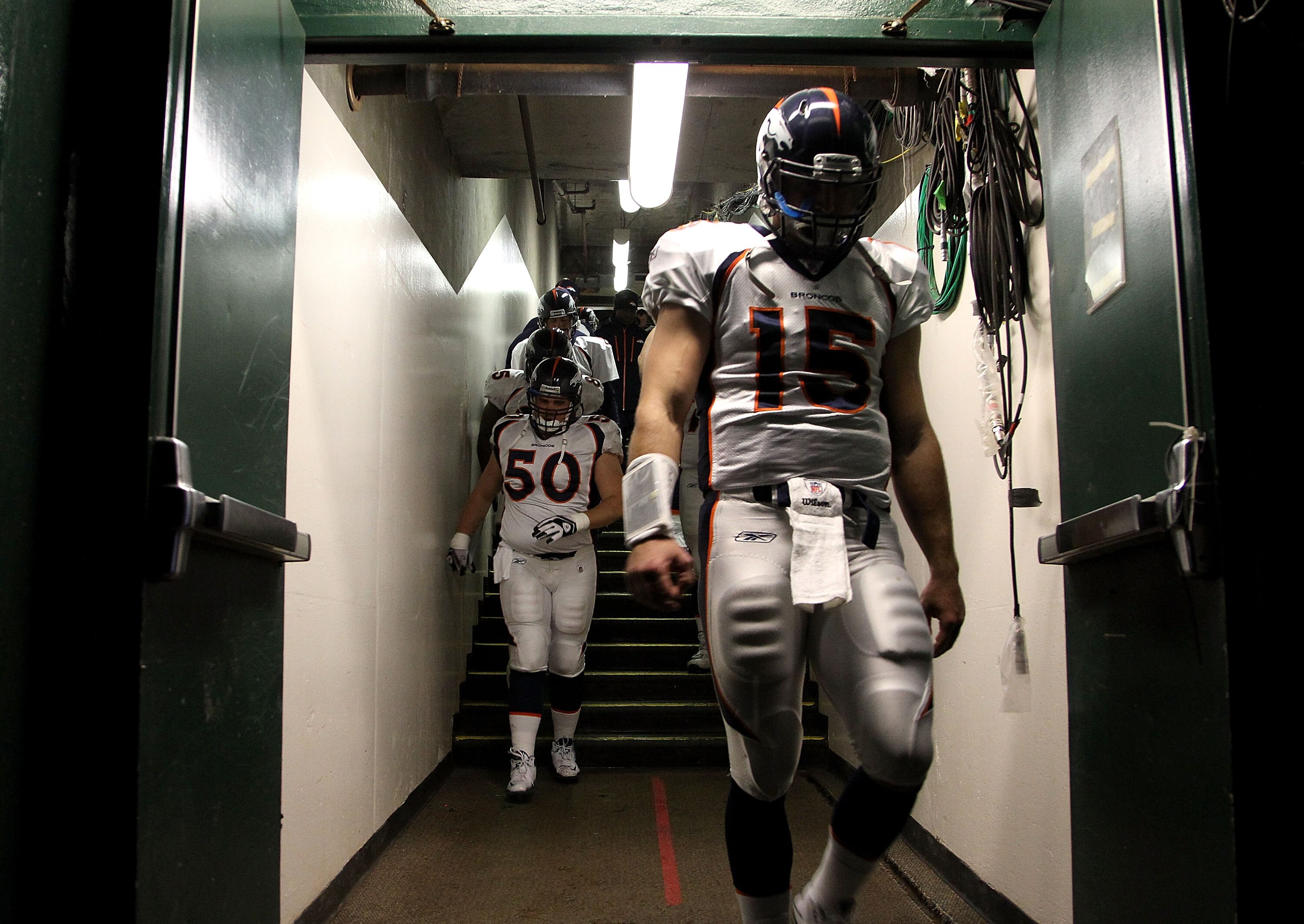 OAKLAND, CA - DECEMBER 19:  Tim Tebow #15 of the Denver Broncos walks out of the lockerroom for their game against the Oakland Raiders at Oakland-Alameda County Coliseum on December 19, 2010 in Oakland, California.  (Photo by Ezra Shaw/Getty Images)