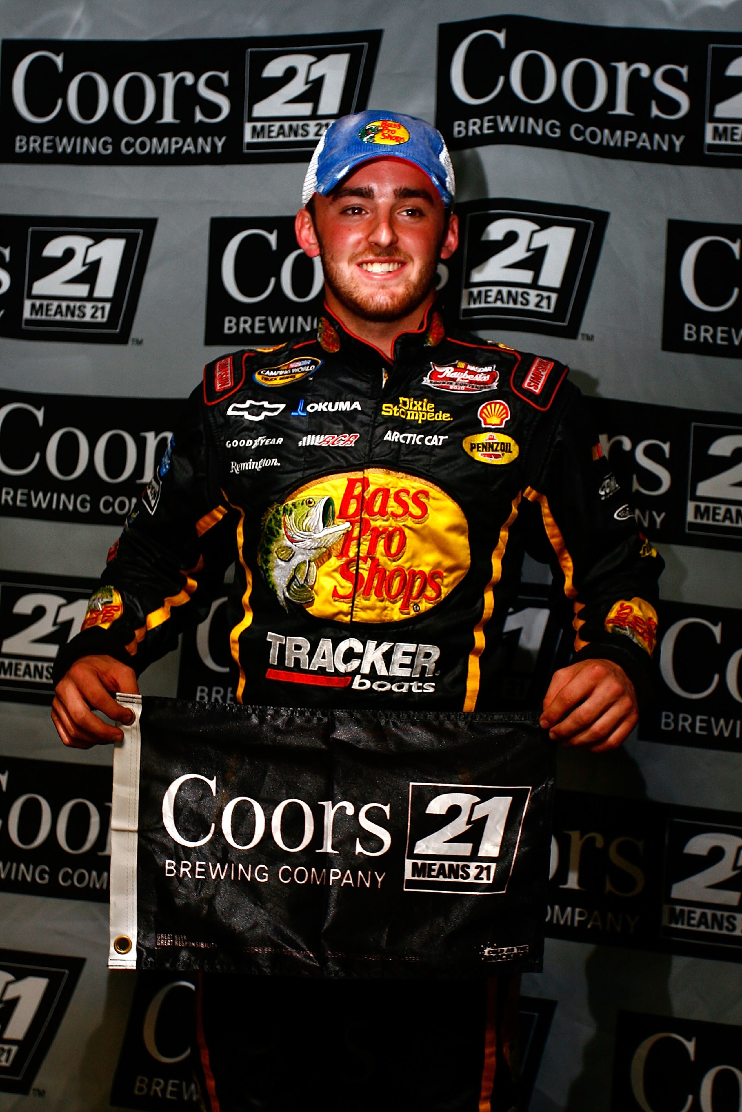 HOMESTEAD, FL - NOVEMBER 19:  Austin Dillon, driver of the 3# Bass Pro Shops/Tracker Boats Chevrolet, poses after qualifying for the pole position in the NASCAR Camping World Truck Series Ford 200 at Homestead-Miami Speedway on November 19, 2010 in Homest