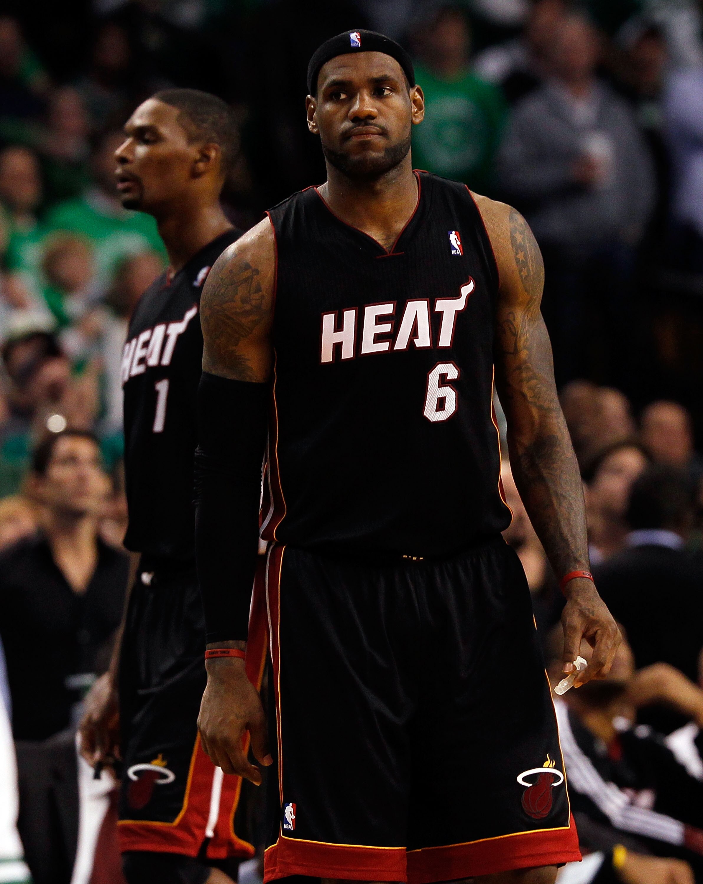 BOSTON, MA - OCTOBER 26: LeBron James #6 and Chris Bosh #1 of the Miami Heat walk into position moments before losing to the Boston Celtics, 88-80, at the TD Banknorth Garden on October 26, 2010 in Boston, Massachusetts. NOTE TO USER: User expressly ackno
