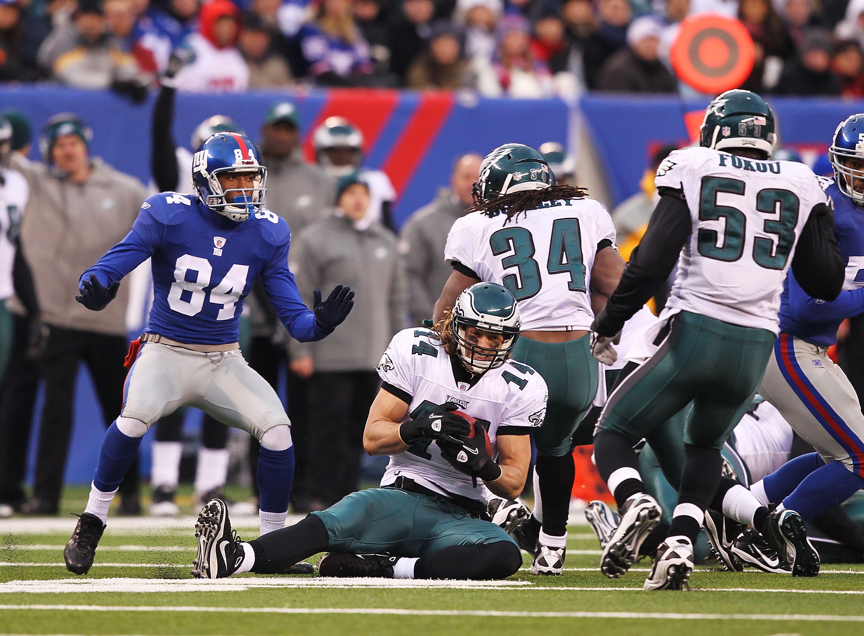 EAST RUTHERFORD, NJ - DECEMBER 19: Riley Cooper #14 of the Philadelphia Eagles recovers an onsides kick against  the New York Giants during their game on December 19, 2010 at The New Meadowlands Stadium in East Rutherford, New Jersey.  (Photo by Al Bello/