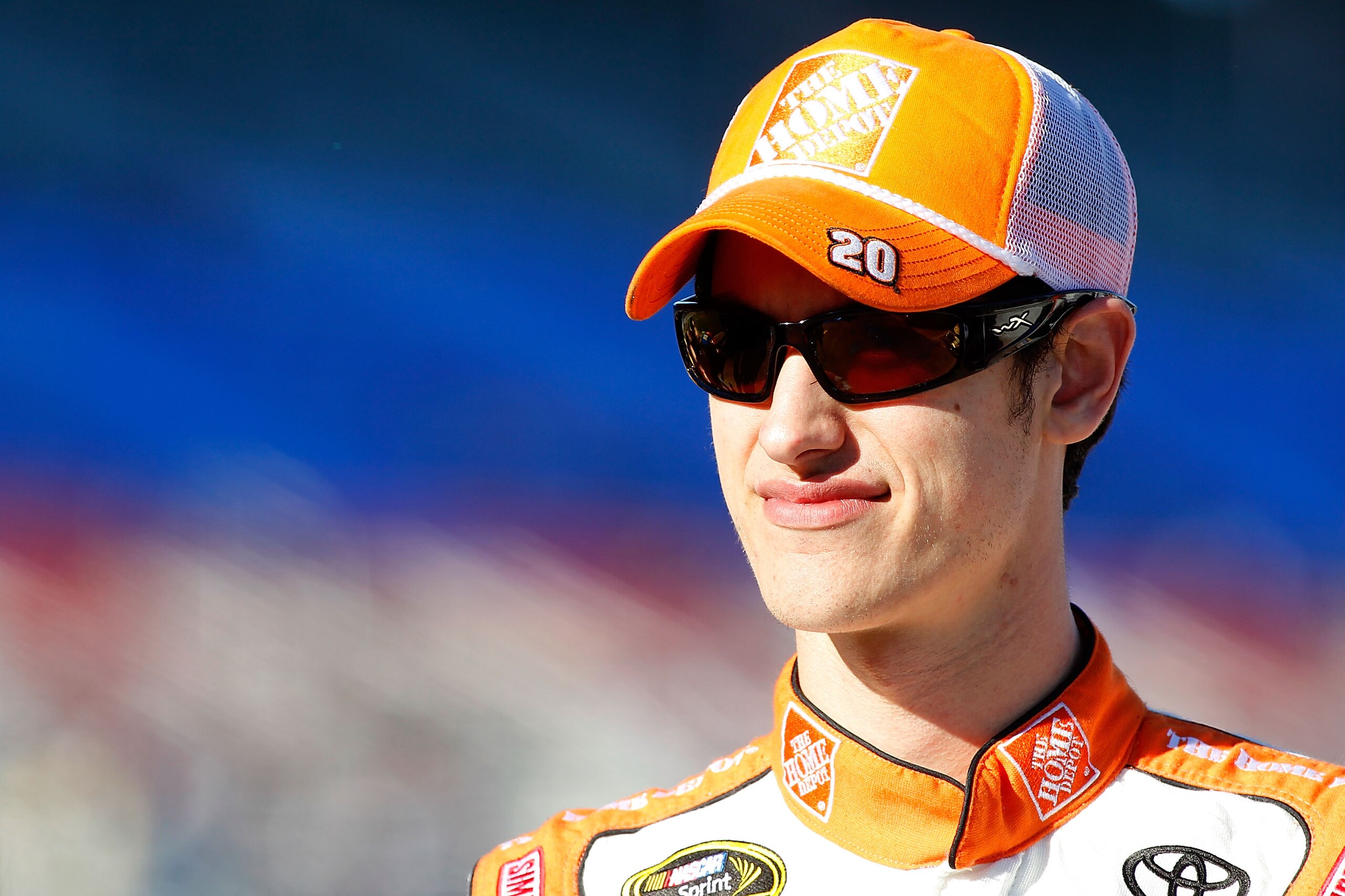 FORT WORTH, TX - NOVEMBER 05:  Joey Logano, driver of the #20 Home Depot Toyota, stands on the grid during qualifying for the NASCAR Sprint Cup Series AAA Texas 500 at Texas Motor Speedway on November 5, 2010 in Fort Worth, Texas.  (Photo by Todd Warshaw/