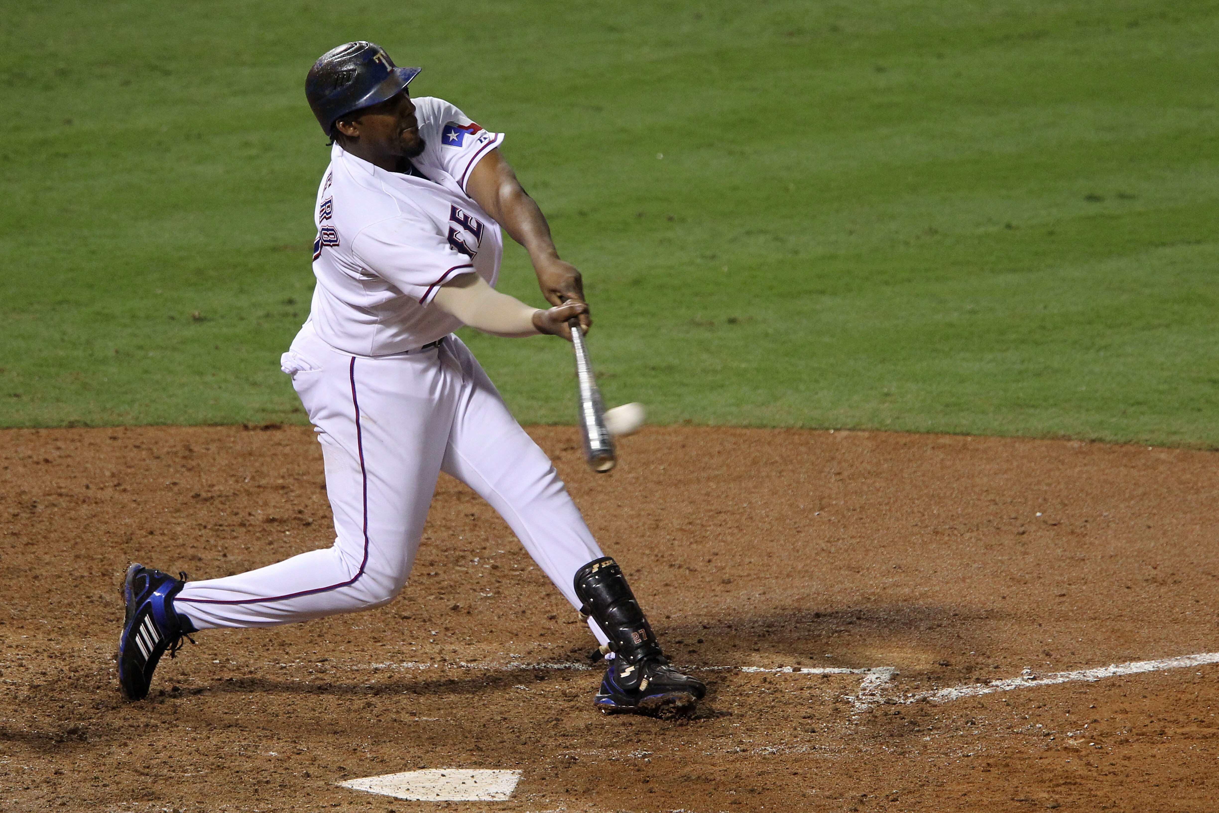 ARLINGTON, TX - OCTOBER 22:  Vladimir Guerrero #27 of the Texas Rangers hits a two run double against the New York Yankees in the fifth inning of Game Six of the ALCS during the 2010 MLB Playoffs at Rangers Ballpark in Arlington on October 22, 2010 in Arl
