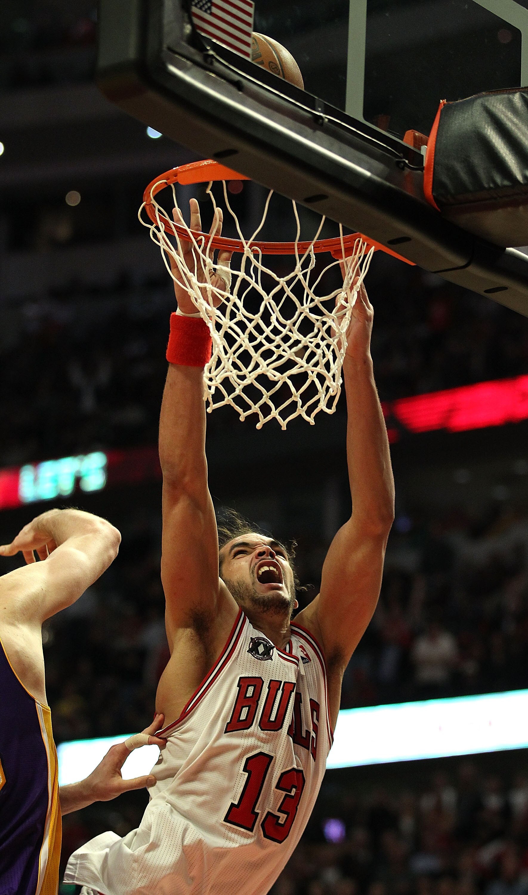CHICAGO, IL - DECEMBER 10: Joakim Noah #13 of the Chicago Bulls puts up a shot against the Los Angeles Lakers at the United Center on December 10, 2010 in Chicago, Illinois. The Bulls defeated the Lakers 88-84. NOTE TO USER: User expressly acknowledges an