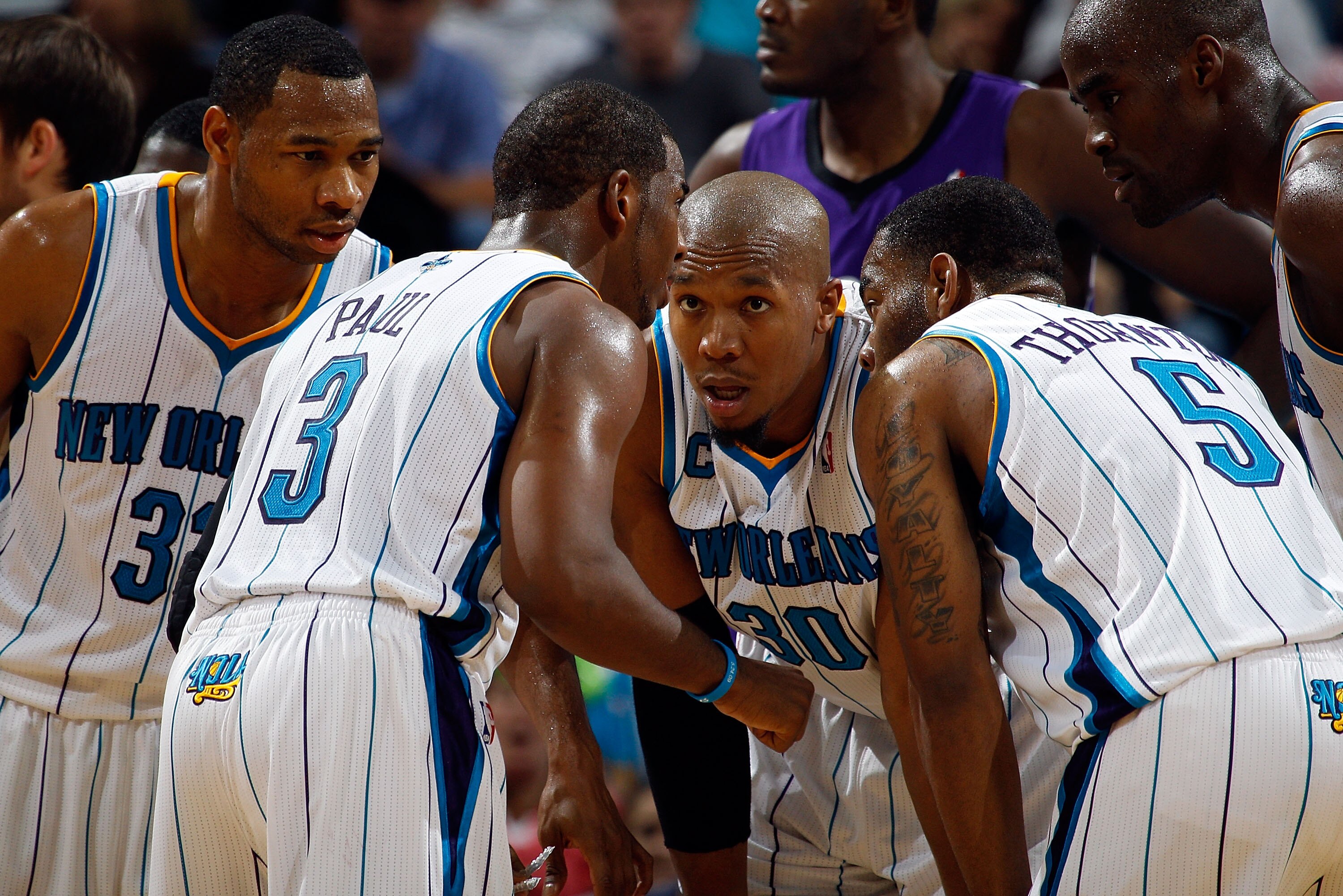 NEW ORLEANS, LA - DECEMBER 15:  Chris Paul #3  of the New Orleans Hornets talks with his team during a time out in the game against the Sacramento Kings at the New Orleans Arena on December 15, 2010 in New Orleans, Louisiana.  NOTE TO USER: User expressly