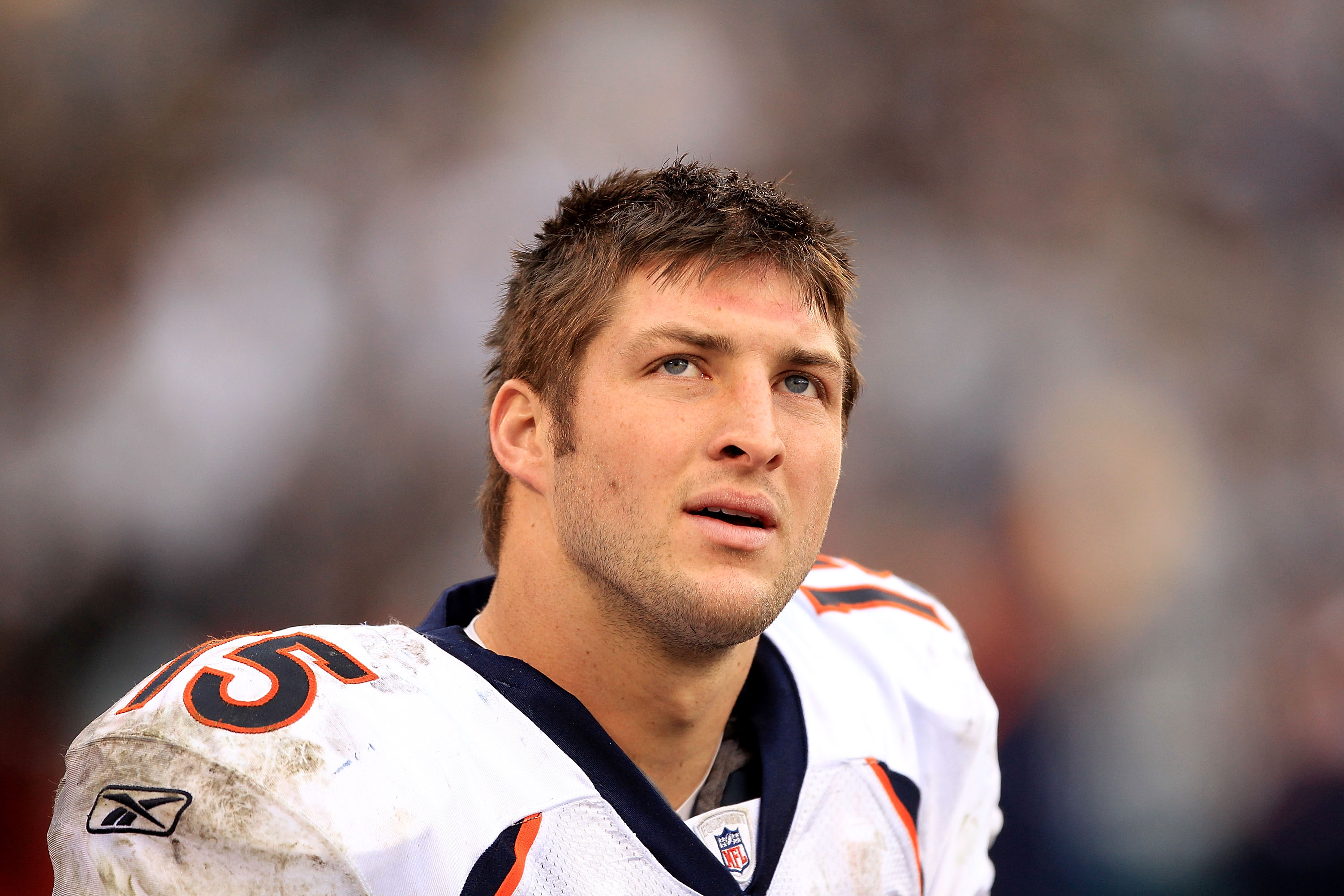 OAKLAND, CA - DECEMBER 19:  Tim Tebow #15 of the Denver Broncos stands on the sideline during their game against the Oakland Raiders at Oakland-Alameda County Coliseum on December 19, 2010 in Oakland, California.  (Photo by Ezra Shaw/Getty Images)