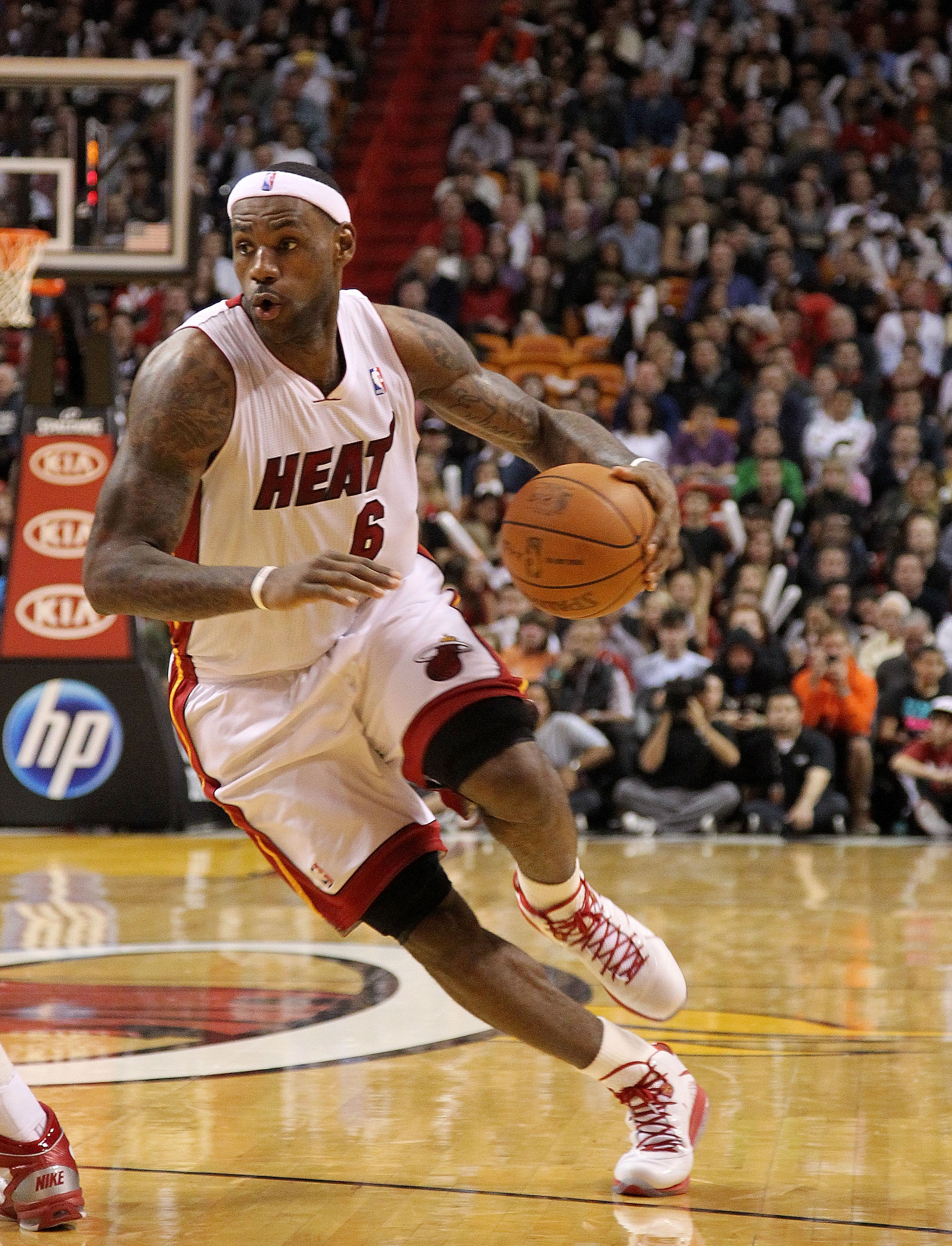 MIAMI, FL - DECEMBER 20:  LeBron James #6 of the Miami Heat drives to the basket during a game against the Dallas Mavericks at American Airlines Arena on December 20, 2010 in Miami, Florida. NOTE TO USER: User expressly acknowledges and agrees that, by do