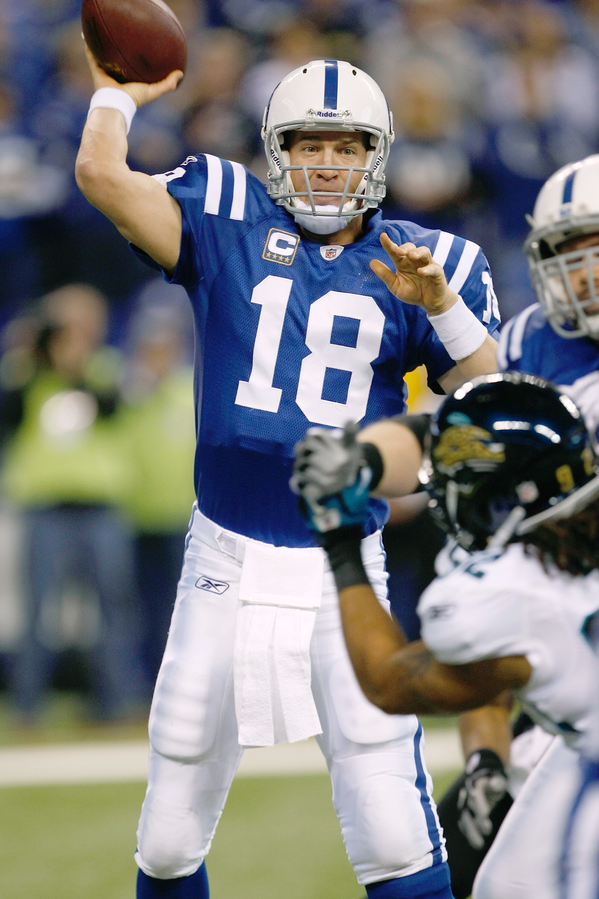 INDIANAPOLIS, IN - DECEMBER 19: Peyton Manning #18 of the Indianapolis Colts passes against the Jacksonville Jaguars at Lucas Oil Stadium on December 19, 2010 in Indianapolis, Indiana.  (Photo by Scott Boehm/Getty Images)