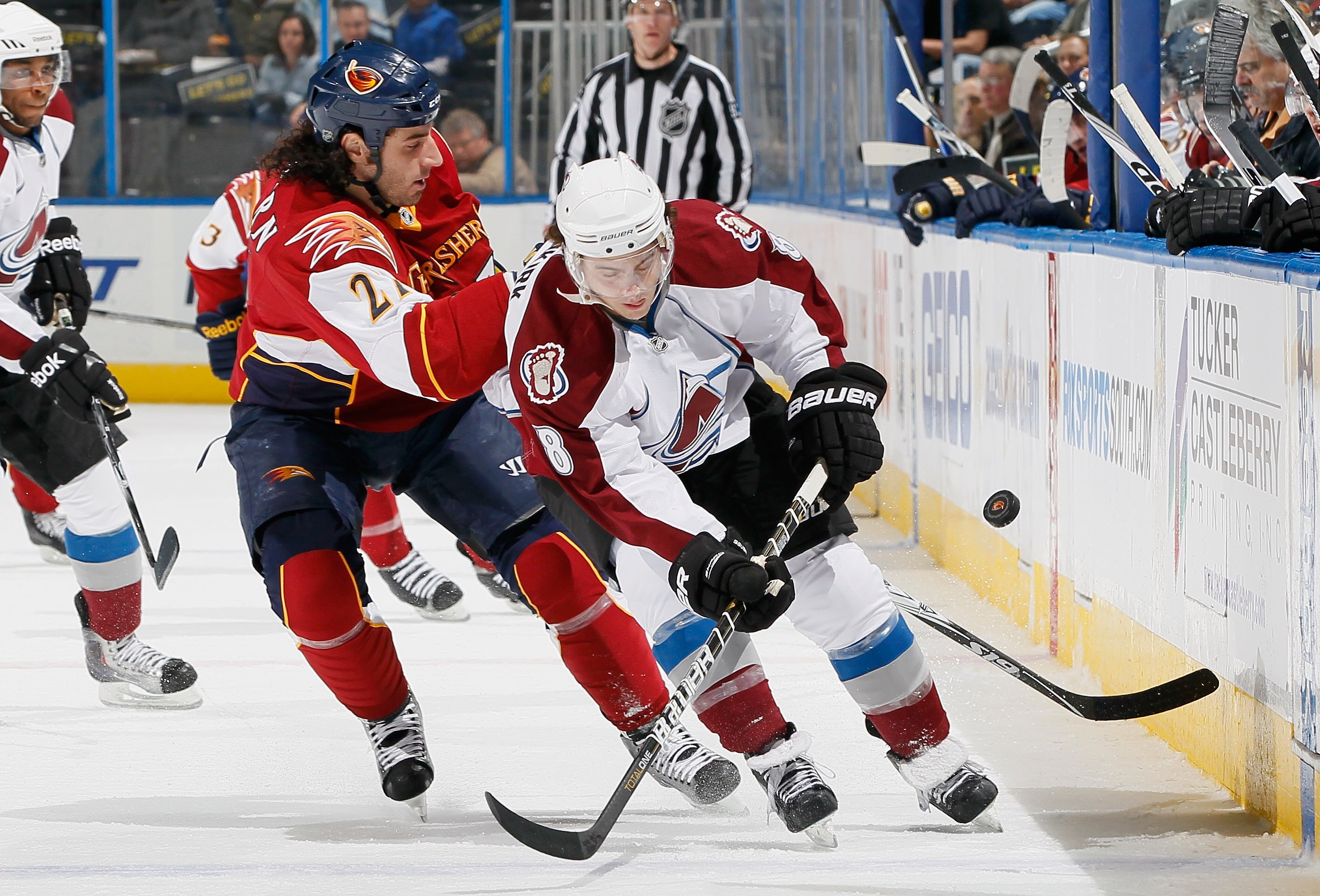 ATLANTA, GA - DECEMBER 10:  Chris Thorburn #27 of the Atlanta Thrashers battles for the puck against Kevin Shattenkirk #8 of the Colorado Avalanche at Philips Arena on December 10, 2010 in Atlanta, Georgia.  (Photo by Kevin C. Cox/Getty Images)
