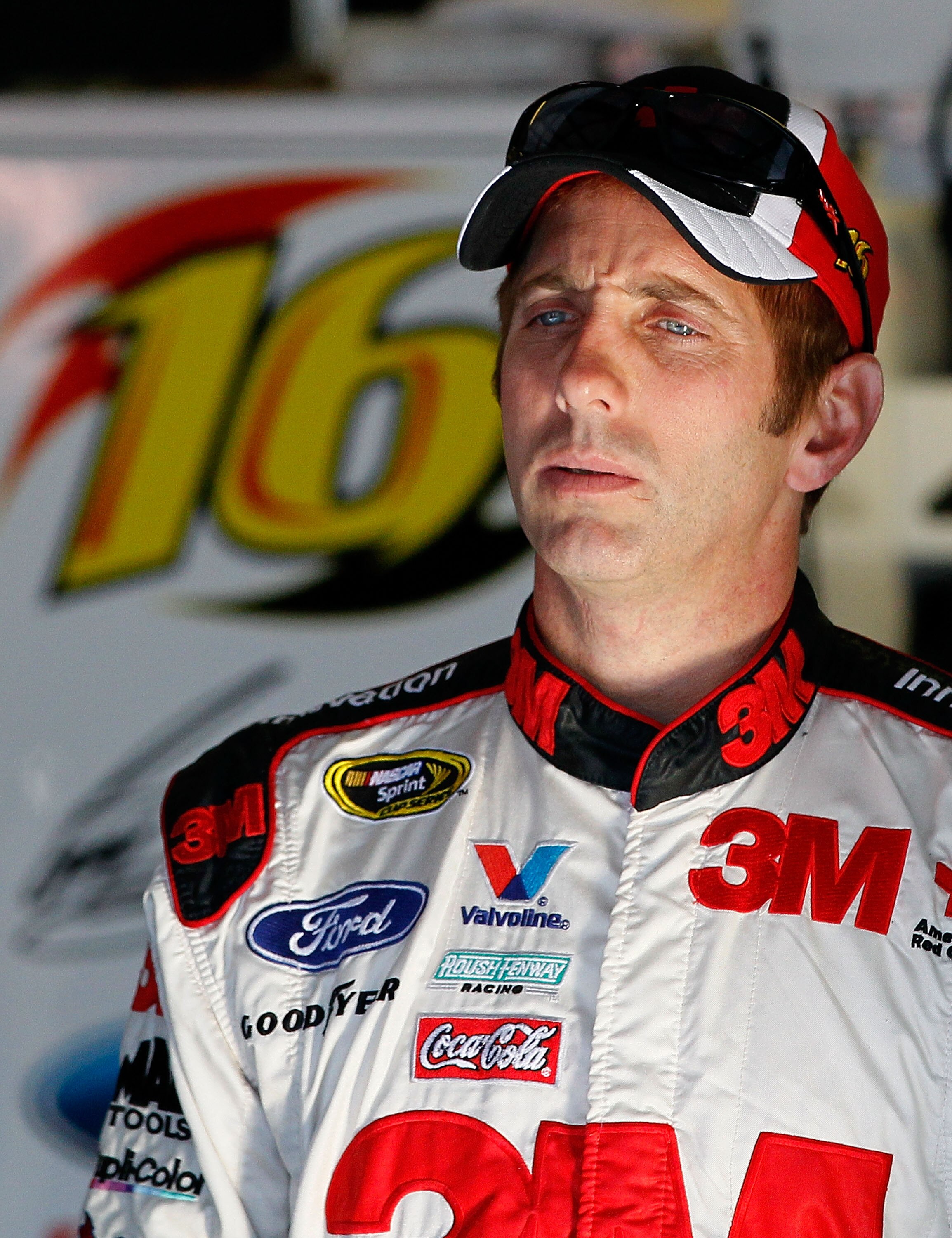TALLADEGA, AL - OCTOBER 29:  Greg Biffle, driver of the #16 3M Ford, stands in the garage during practice for the NASCAR Sprint Cup Series AMP Energy Juice 500 at Talladega Superspeedway on October 29, 2010 in Talladega, Alabama.  (Photo by Kevin C. Cox/G