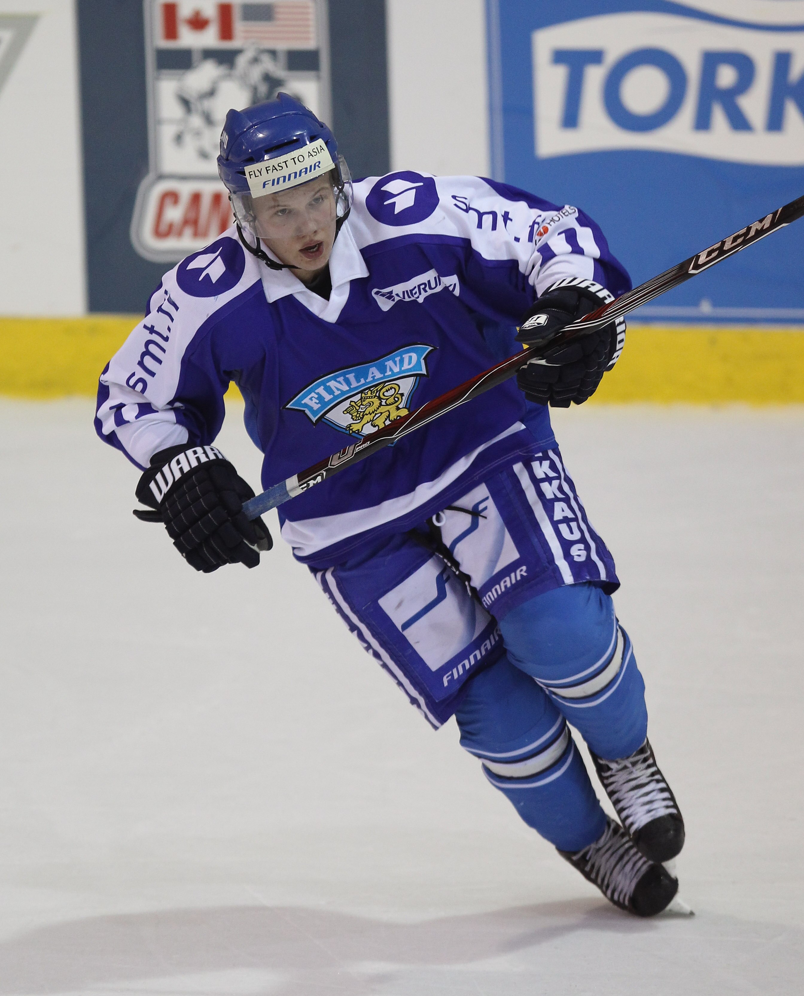 LAKE PLACID, NY - AUGUST 04:  Toni Rajala #11 of Team Finland skates against Team USA at the USA Hockey National Evaluation Camp on August 4, 2010 in Lake Placid, New York. The USA defeated Finland 6-3.  (Photo by Bruce Bennett/Getty Images)