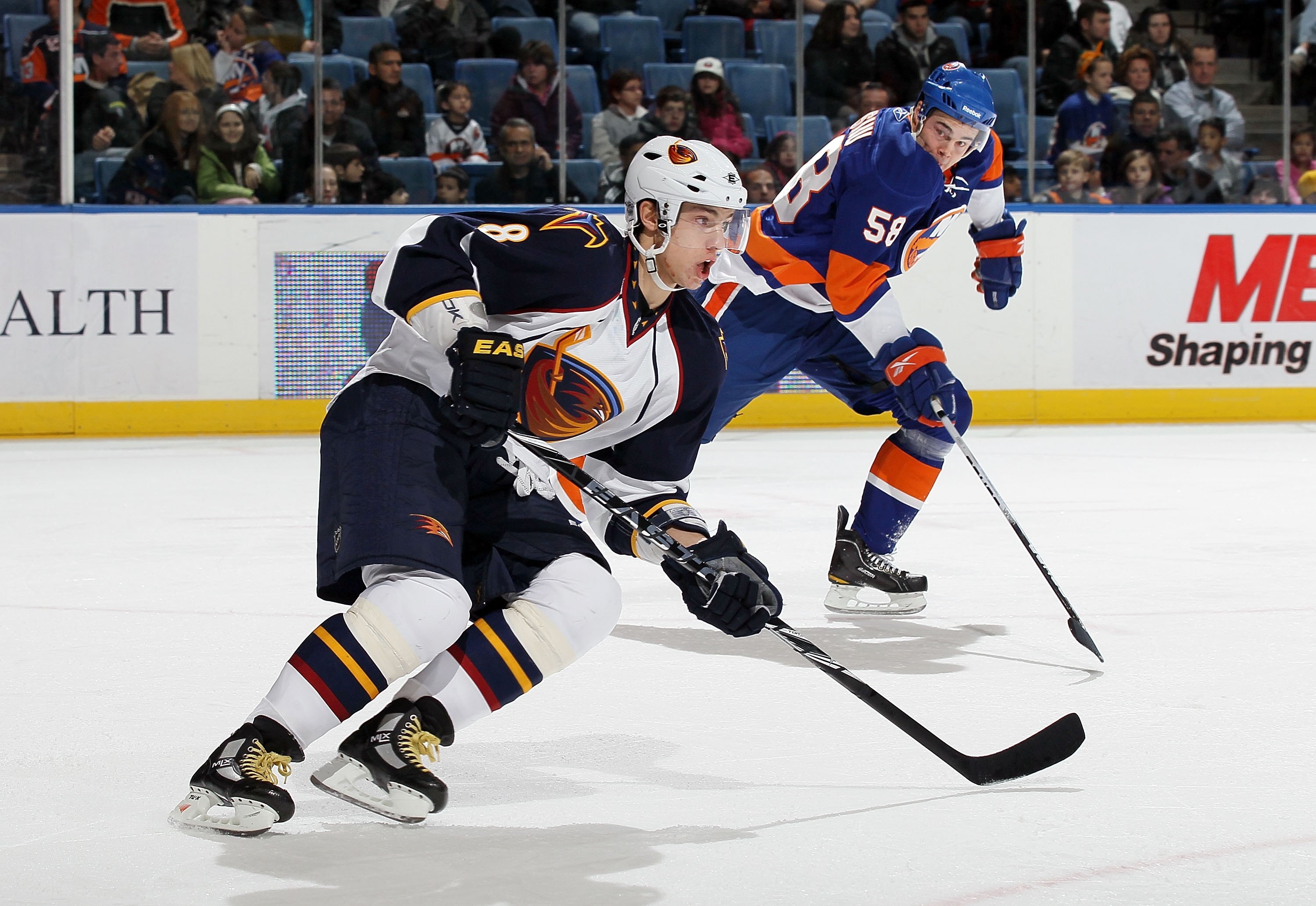 UNIONDALE, NY - DECEMBER 11:  Alexander Burmistrov #8 of the Atlanta Thrashers skates against the New York Islanders on December 11, 2010 at Nassau Coliseum in Uniondale, New York. The Thrashers defeated the Isles 5-4.  (Photo by Jim McIsaac/Getty Images)