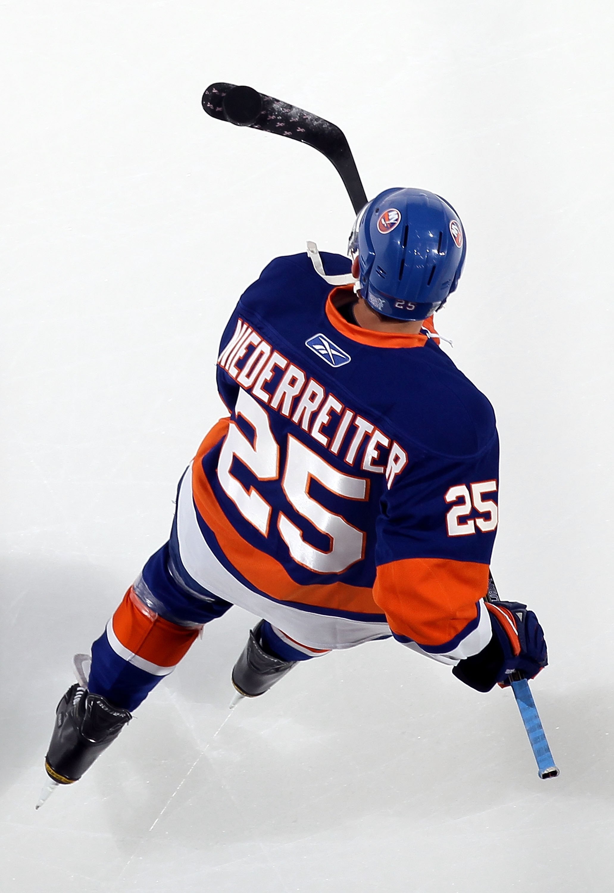 UNIONDALE, NY - OCTOBER 16:  Nino Niederreiter #25 of the New York Islanders warms up before playing against the Colorado Avalanche on October 16, 2010 at Nassau Coliseum in Uniondale, New York.  (Photo by Jim McIsaac/Getty Images)