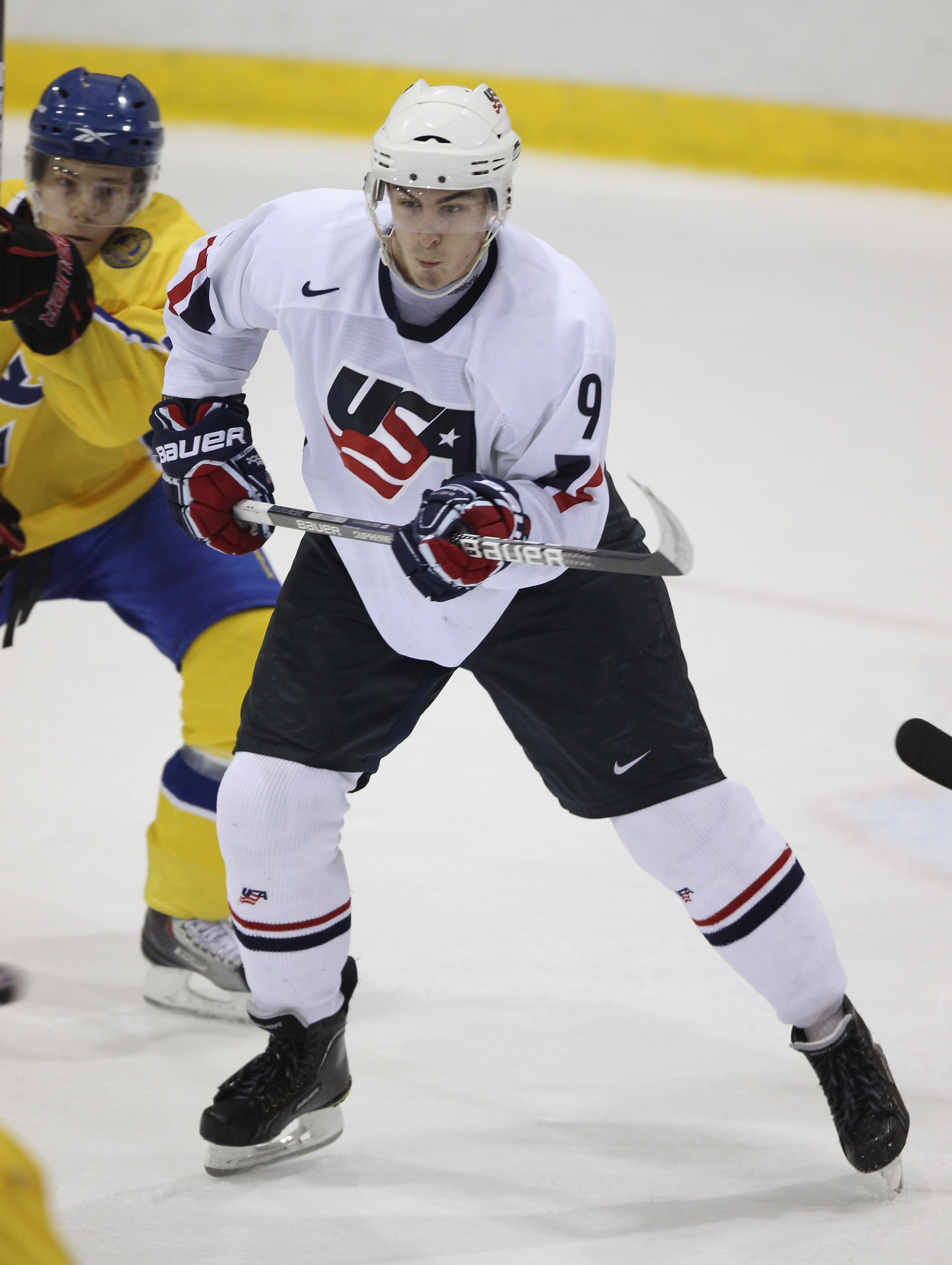 LAKE PLACID, NY - AUGUST 03: Chris Kreider #9 of Team USA skates against Team Sweden at the USA Hockey National Evaluation Camp on August 3, 2010 in Lake Placid, New York. Team USA defeated Team Sweden 6-3. (Photo by Bruce Bennett/Getty Images)