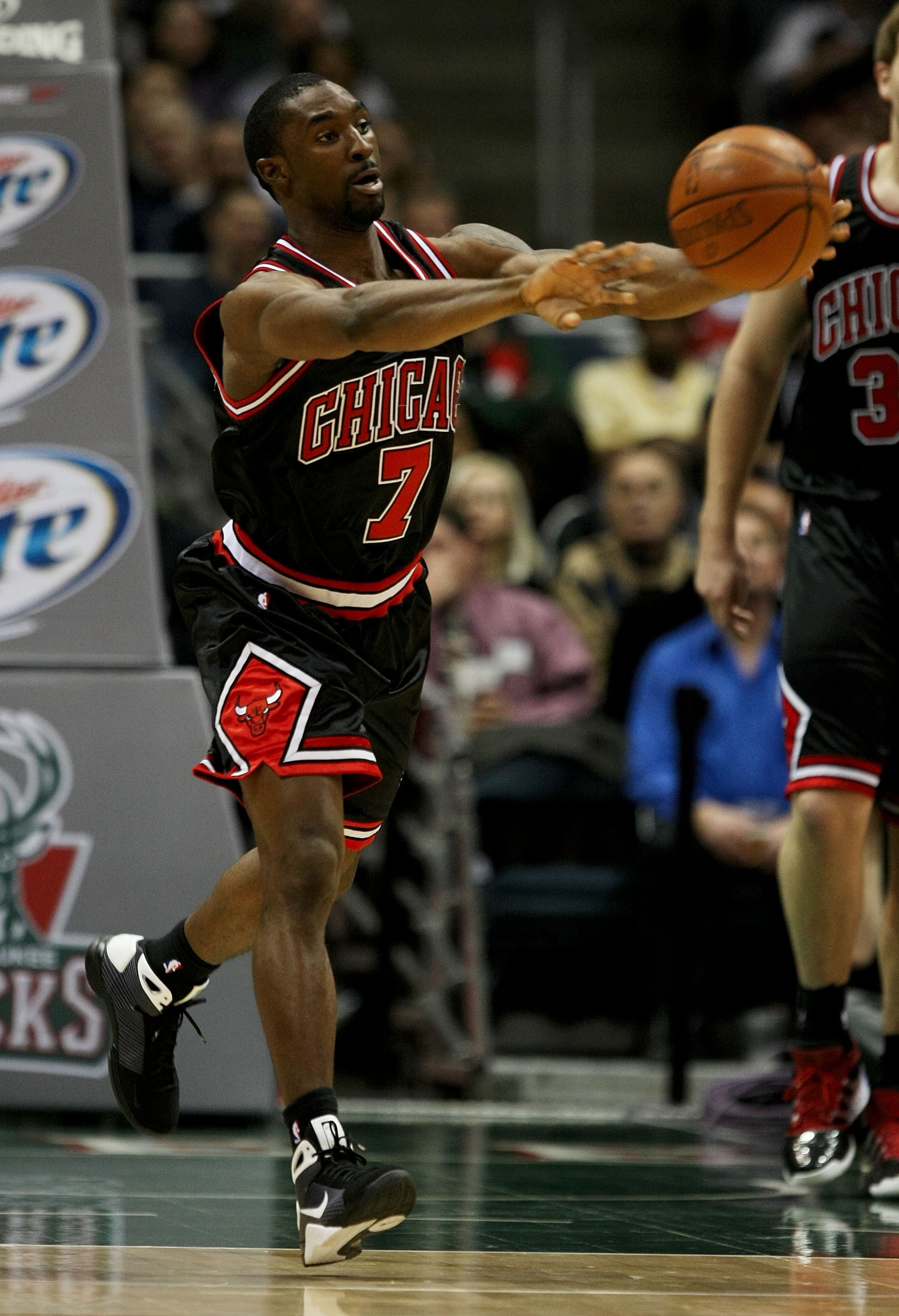 MILWAUKEE - FEBRUARY 18: Ben Gordon #7 of the Chicago Bulls passes the ball against the Milwaukee Bucks on February 18, 2009 at the Bradley Center in Milwaukee, Wisconsin. The Bulls defeated the Bucks 113-104. NOTE TO USER: User expressly acknowledges and MILWAUKEE - FEBRUARY 18: Ben Gordon #7 of the Chicago Bulls passes the ball against the Milwaukee Bucks on February 18, 2009 at the Bradley Center in Milwaukee, Wisconsin. The Bulls defeated the Bucks 113-104. NOTE TO USER: User expressly acknowledges and