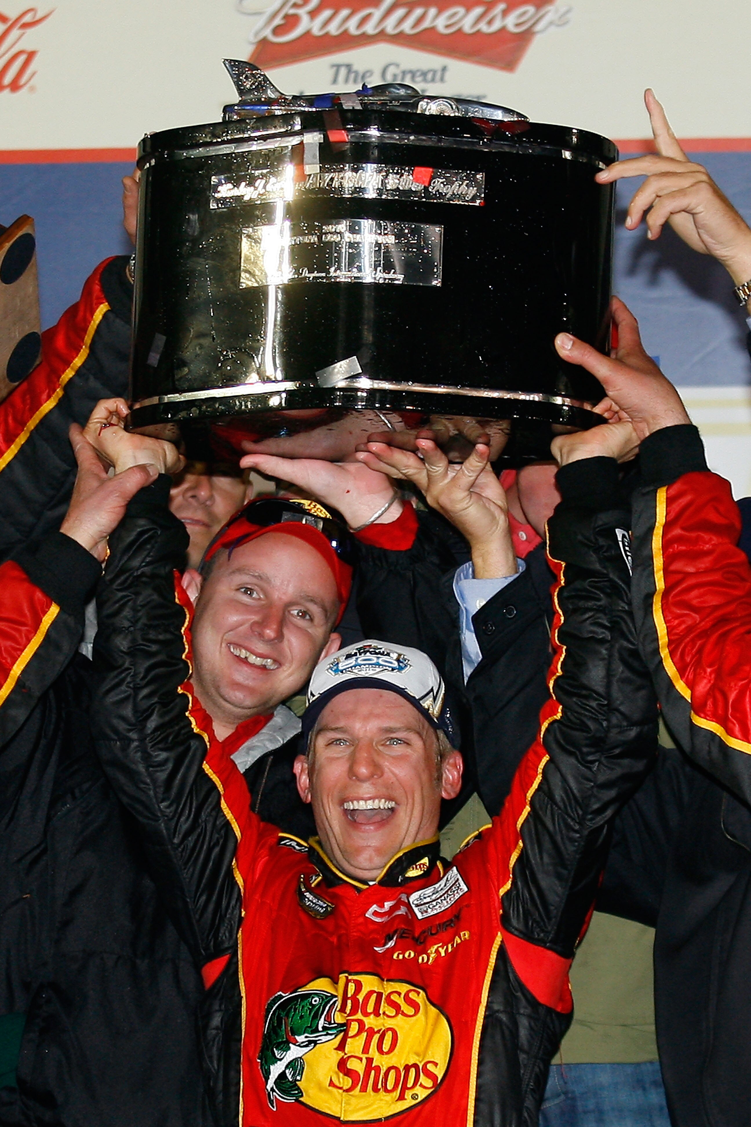 DAYTONA BEACH, FL - FEBRUARY 14:  Jamie McMurray, driver of the #1 Bass Pro Shops/Tracker Boats Chevrolet, celebrates in Victory Lane after winning the NASCAR Sprint Cup Series Daytona 500 at Daytona International Speedway on February 14, 2010 in Daytona