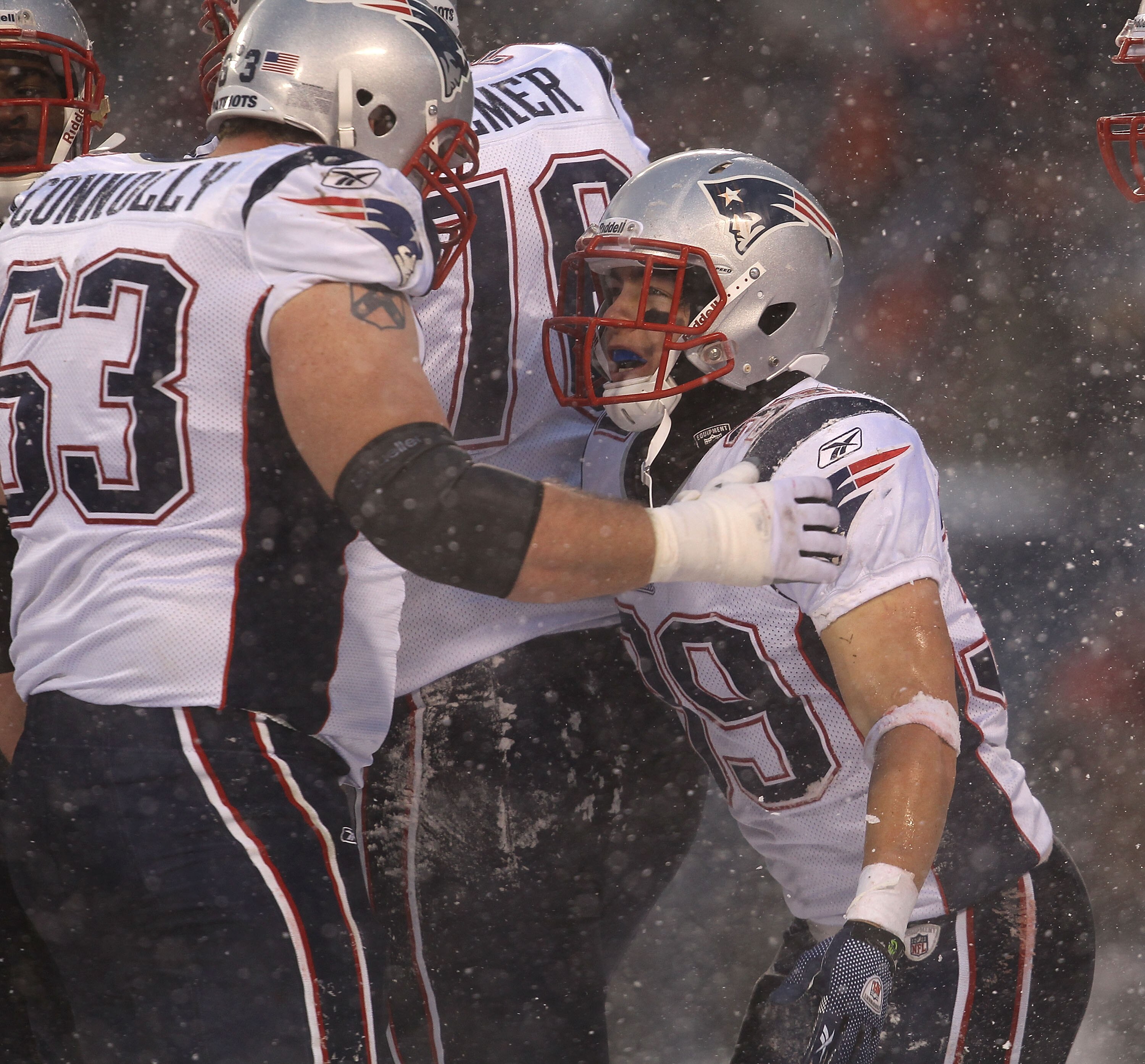 CHICAGO, IL - DECEMBER 12: Danny Woodhead #39 of the New England Patriots celebrates a touchdown run with teammate Dan Connolly #63 against the Chicago Bears at Soldier Field on December 12, 2010 in Chicago, Illinois. The Patriots defeated the Bears 36-7.