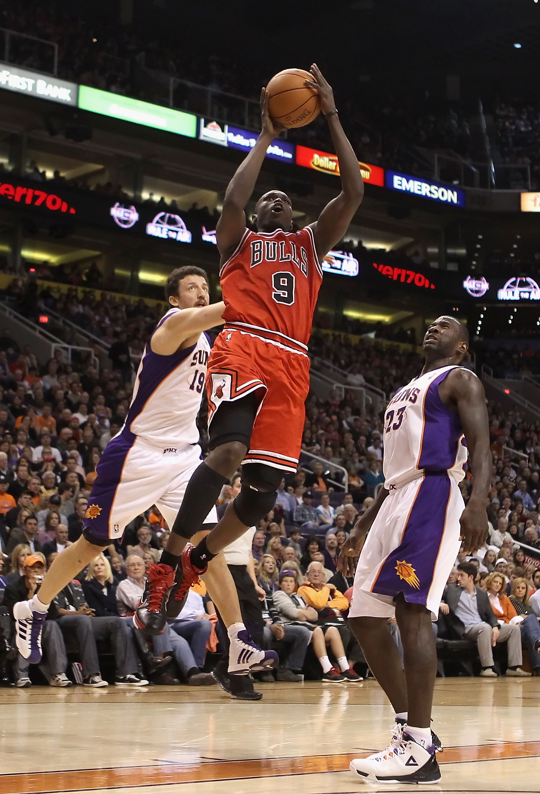 PHOENIX - NOVEMBER 24:  Luol Deng #9 of the Chicago Bulls puts up a shot during the NBA game against the Phoenix Suns at US Airways Center on November 24, 2010 in Phoenix, Arizona. The Bulls defeated the Suns 123-115 in double overtime.  NOTE TO USER: Use