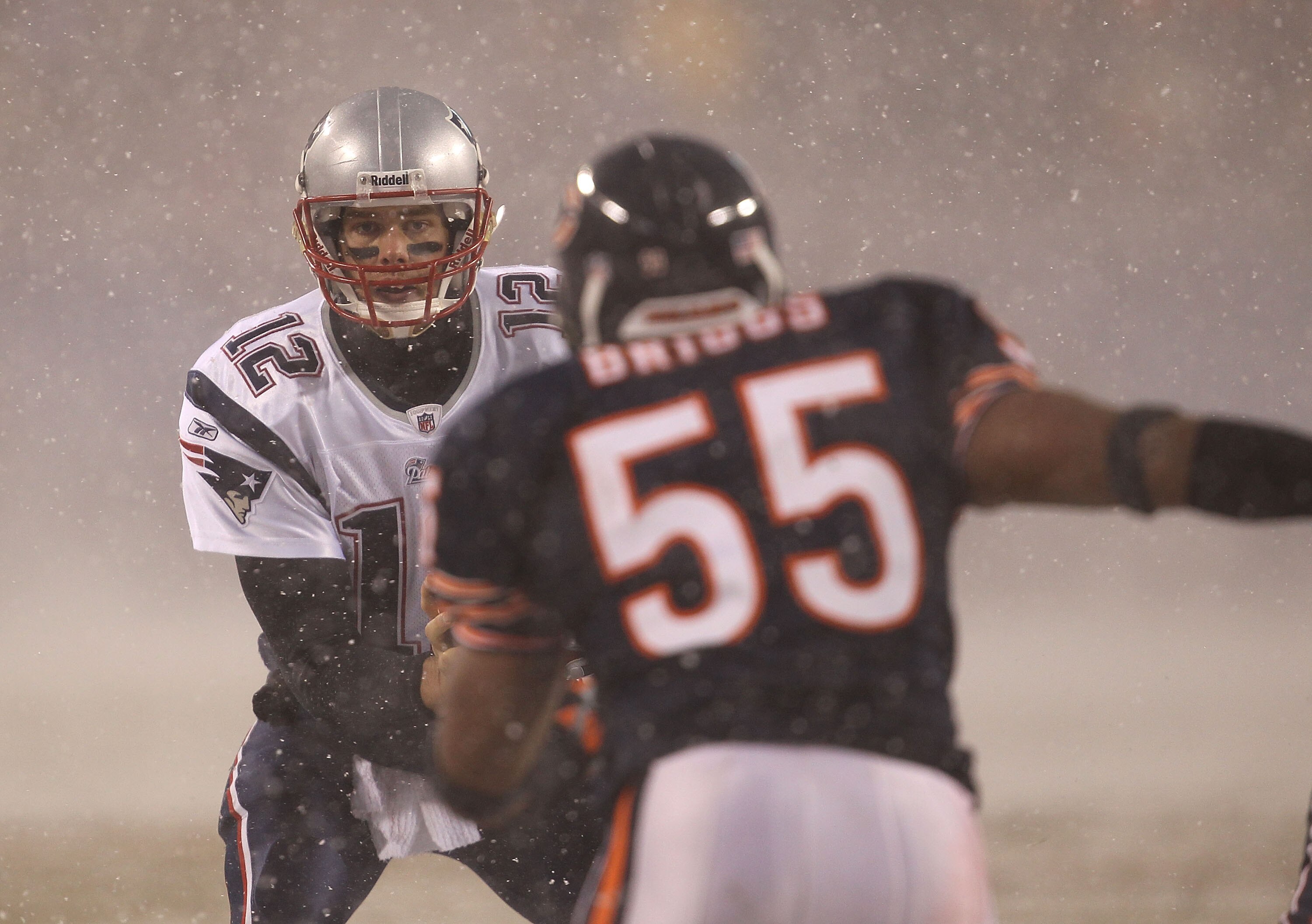 CHICAGO, IL - DECEMBER 12: Lance Briggs #55 of the Chicago Bears rushes against Tom Brady #12 of the New England Patriots at Soldier Field on December 12, 2010 in Chicago, Illinois. The Patriots defeated the Bears 36-7. (Photo by Jonathan Daniel/Getty Ima