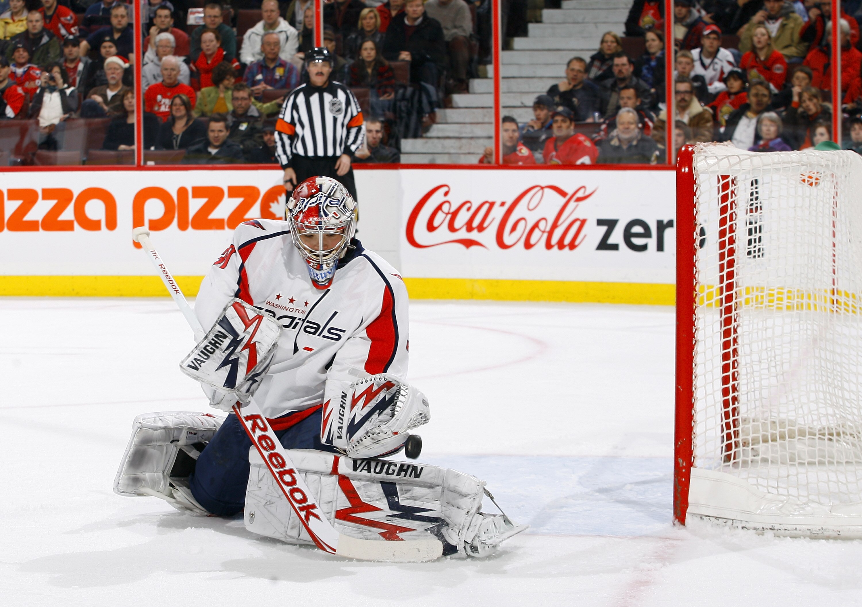 OTTAWA, ON - DECEMBER 19:  Michal Neuvirth #30 of the Washington Capitals kicks out a left pad save against the Ottawa Senators in a game at Scotiabank Place on December 19, 2010 in Ottawa, Canada.  (Photo by Phillip MacCallum/Getty Images)