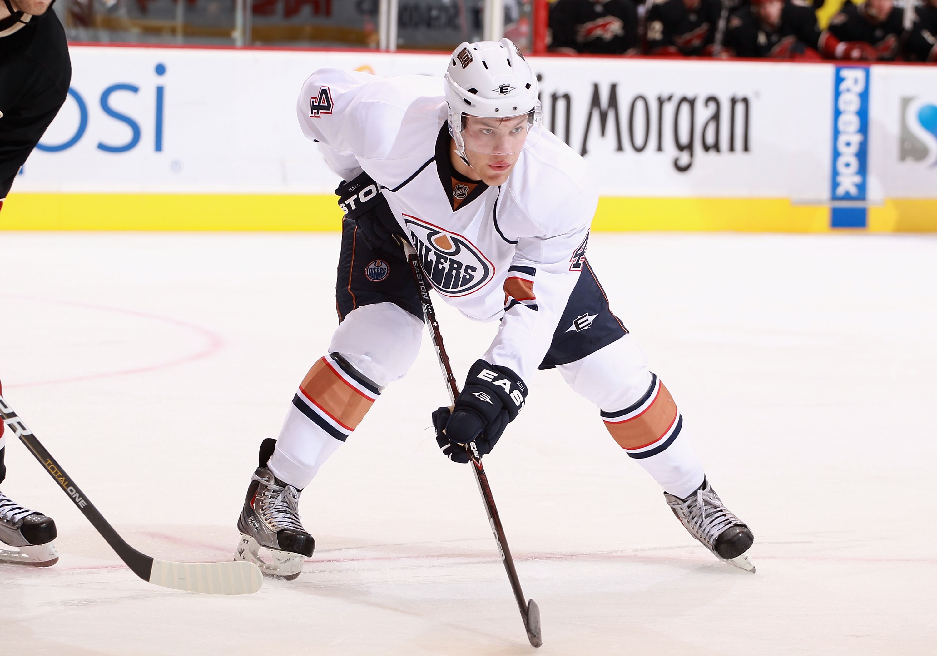 GLENDALE, AZ - NOVEMBER 23:  Taylor Hall #4 of the Edmonton Oilers awaits a face off during the NHL game against the Phoenix Coyotes at Jobing.com Arena on November 23, 2010 in Glendale, Arizona.  The Coyotes defeated the Oilers 5-0.  (Photo by Christian