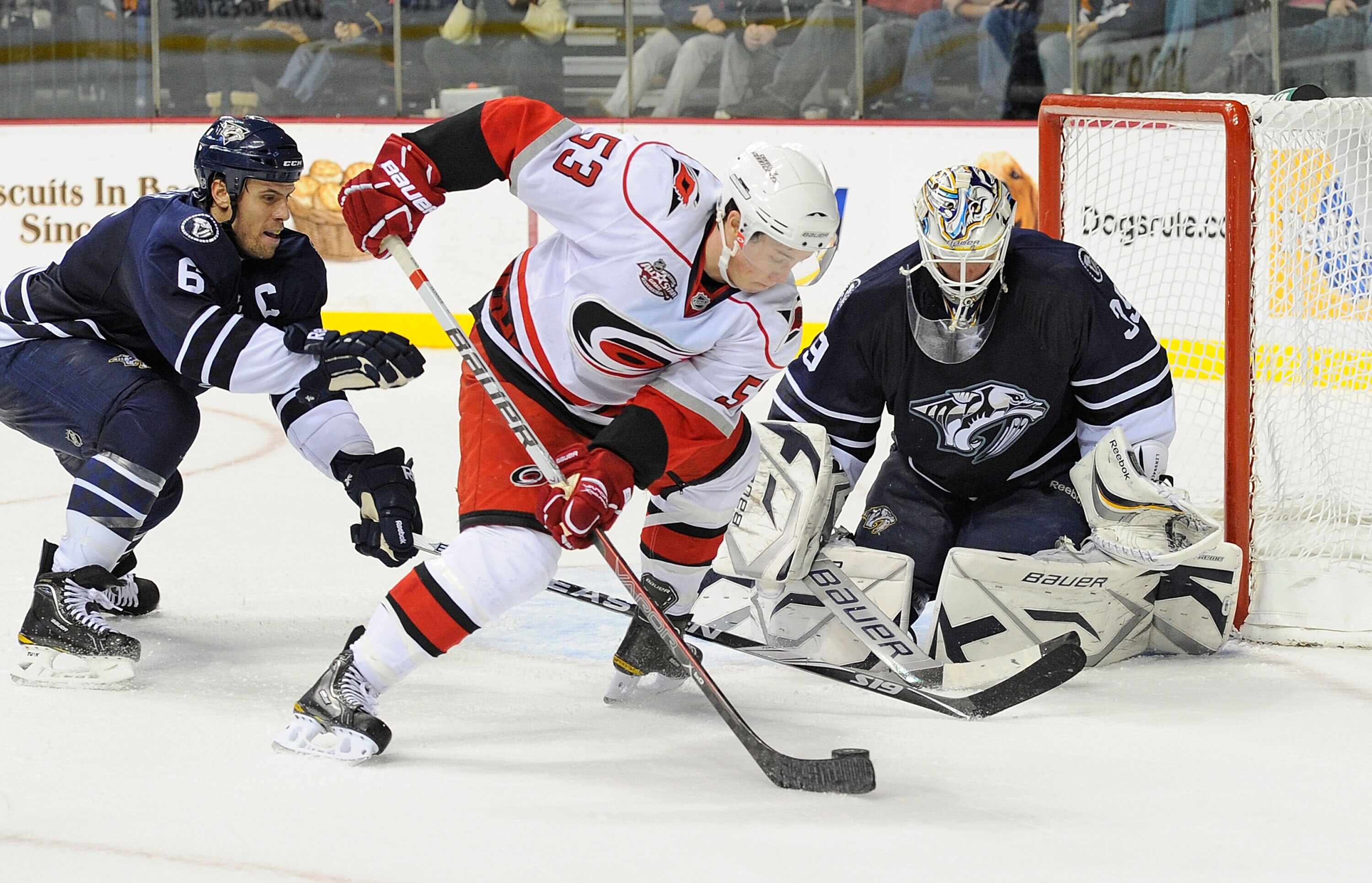 NASHVILLE, TN - DECEMBER 04:  Jeff Skinner #53 of the Carolina Hurricanes takes a shot on Anders Lindback #39 of the Nashville Predatorson December 4, 2010 at the Bridgestone Arena in Nashville, Tennessee.  (Photo by Frederick Breedon/Getty Images)