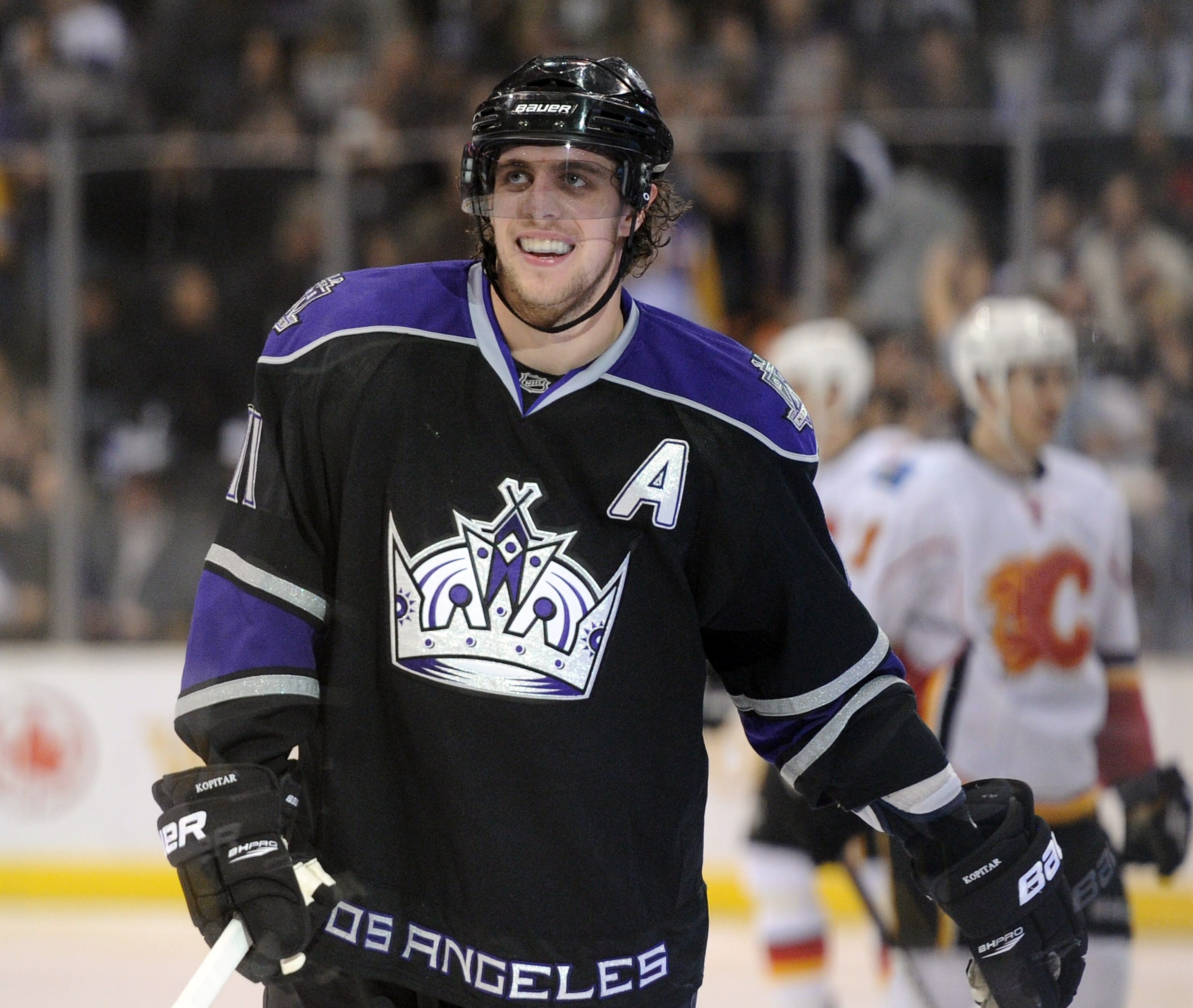 LOS ANGELES, CA - DECEMBER 09: Anze Kopitar #11 of the Los Angeles Kings reacts to his goal for a 2-0 lead over the Calgary Flames during the third period at the Staples Center on December 9, 2010 in Los Angeles, California.  (Photo by Harry How/Getty Ima