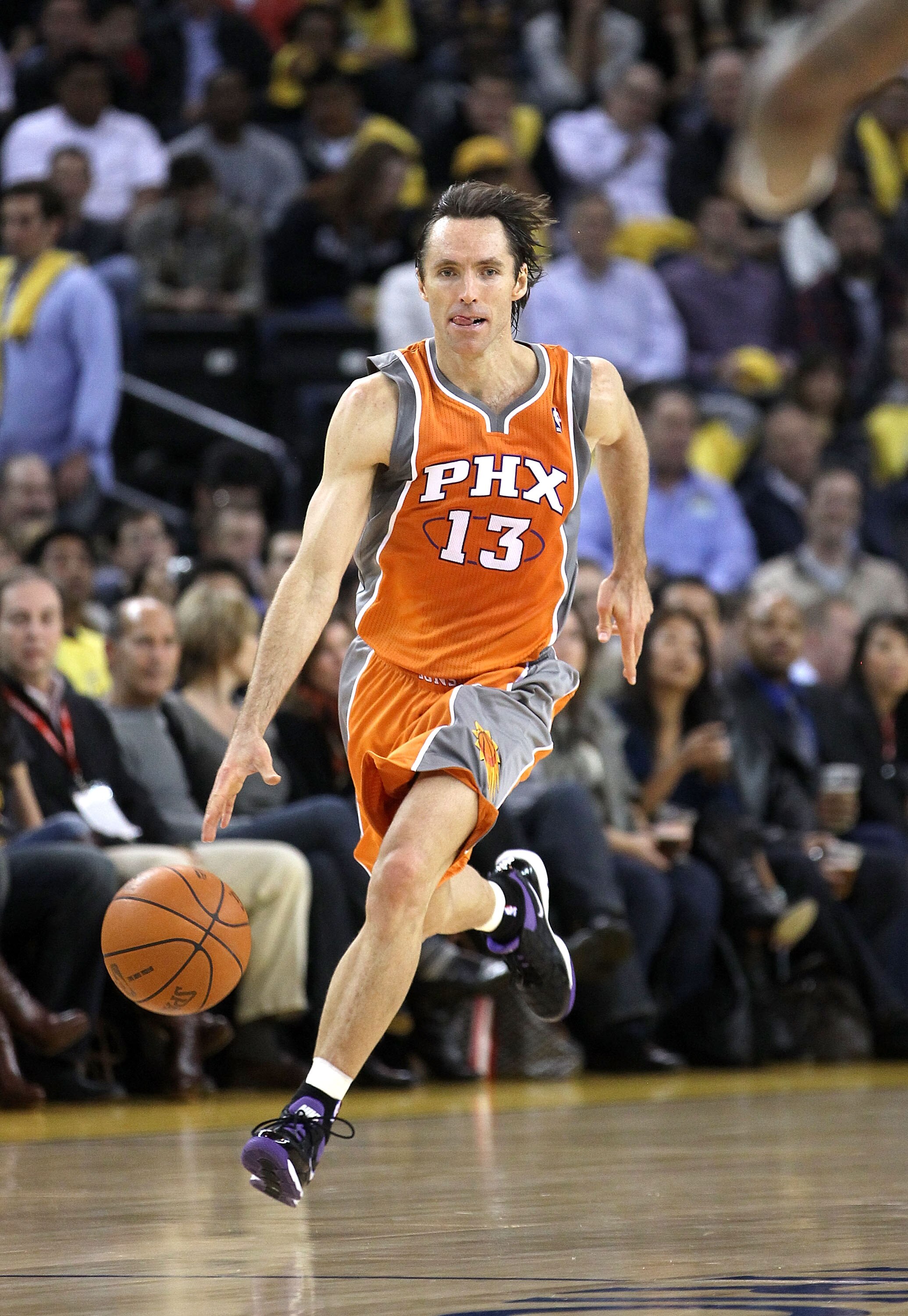 OAKLAND, CA - DECEMBER 02:  Steve Nash #13 of the Phoenix Suns in action against the Golden State Warriors at Oracle Arena on December 2, 2010 in Oakland, California. NOTE TO USER: User expressly acknowledges and agrees that, by downloading and or using t